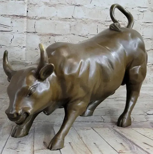 Bronze bull statue symbolizing strength power and financial growth