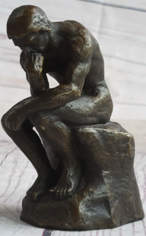Bronze abstract sculpture of a seated figure with hand on chin on a marble base