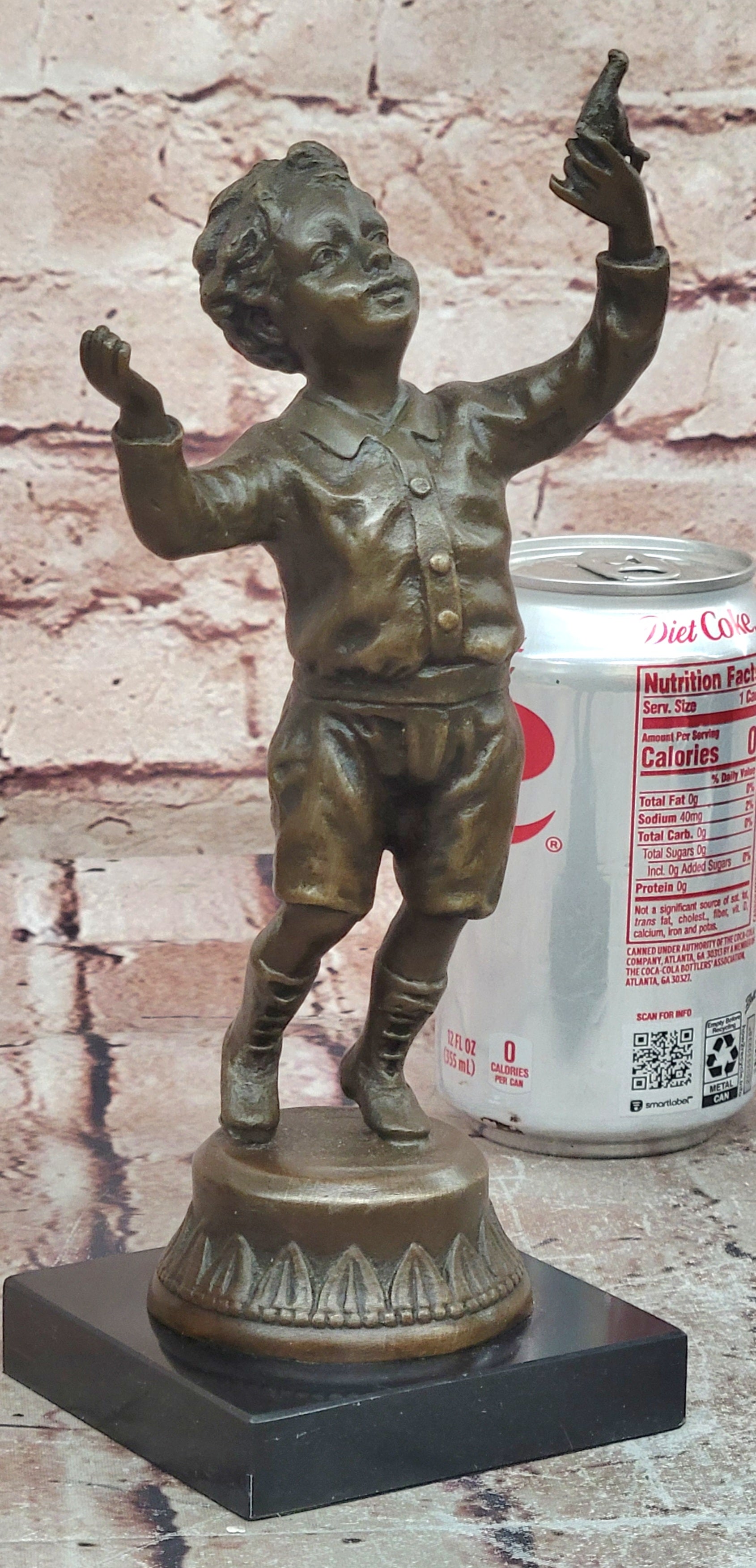 Milo`s Artistry: Intricate Bronze Statue of a Boy Holding a Bird - Handmade by Miguel Lopez