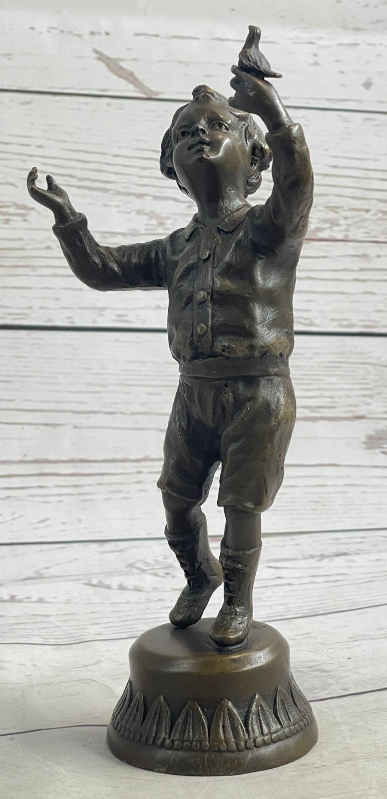 Milo`s Artistry: Intricate Bronze Statue of a Boy Holding a Bird - Handmade by Miguel Lopez