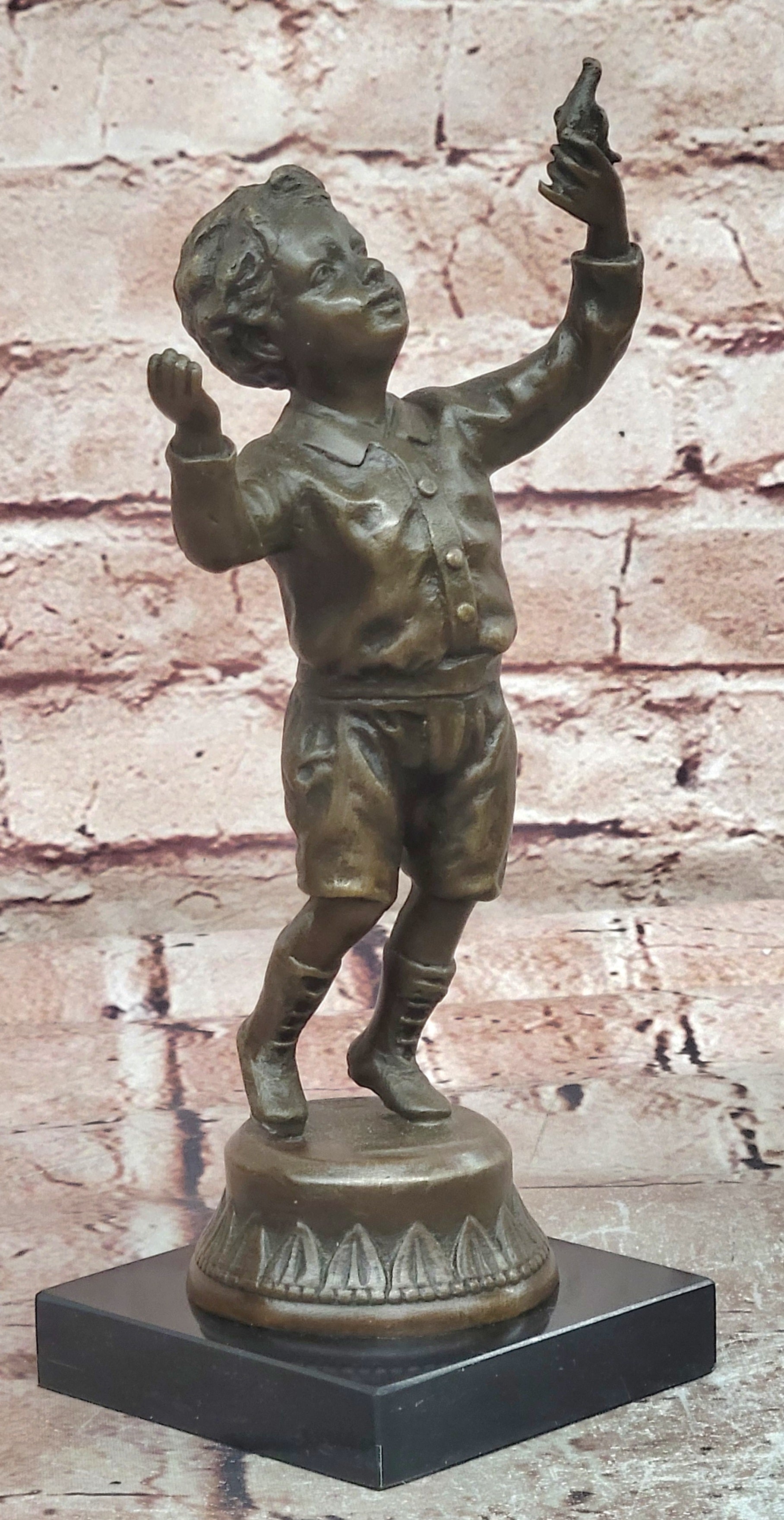 Milo`s Artistry: Intricate Bronze Statue of a Boy Holding a Bird - Handmade by Miguel Lopez