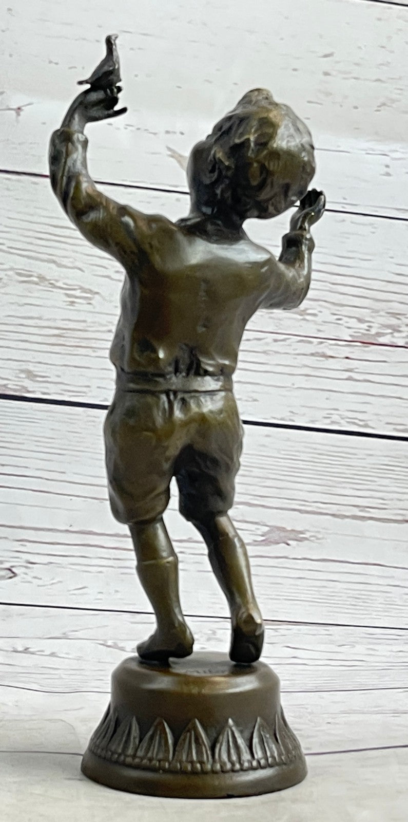 Milo`s Artistry: Intricate Bronze Statue of a Boy Holding a Bird - Handmade by Miguel Lopez