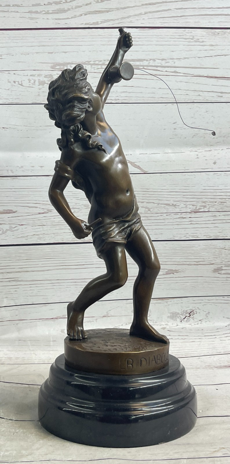 Goldscheider France: Classic Bronze Boy Statue Playing with Yoyo Deal