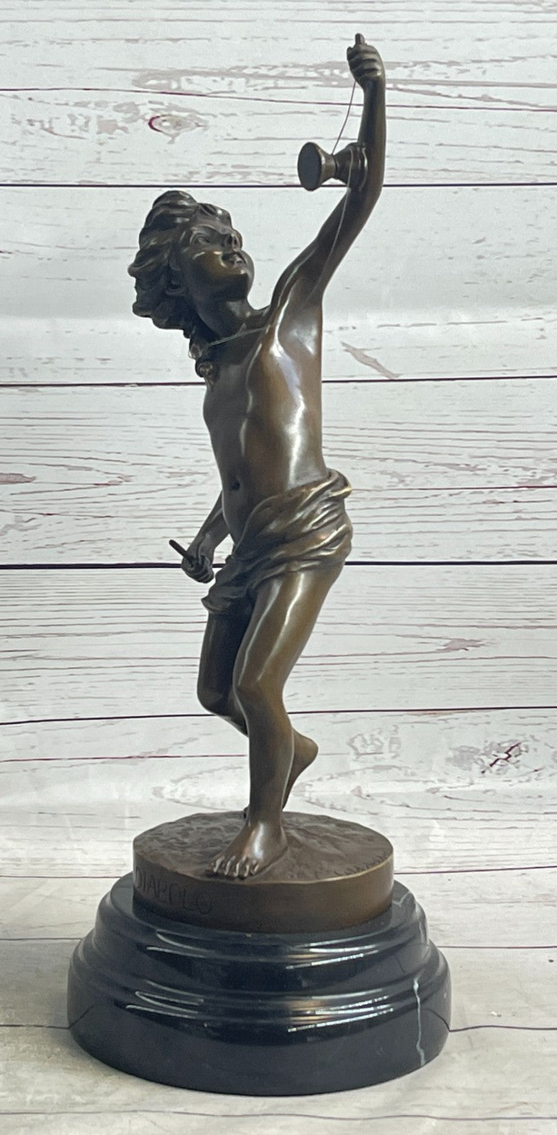 Goldscheider France: Classic Bronze Boy Statue Playing with Yoyo Deal