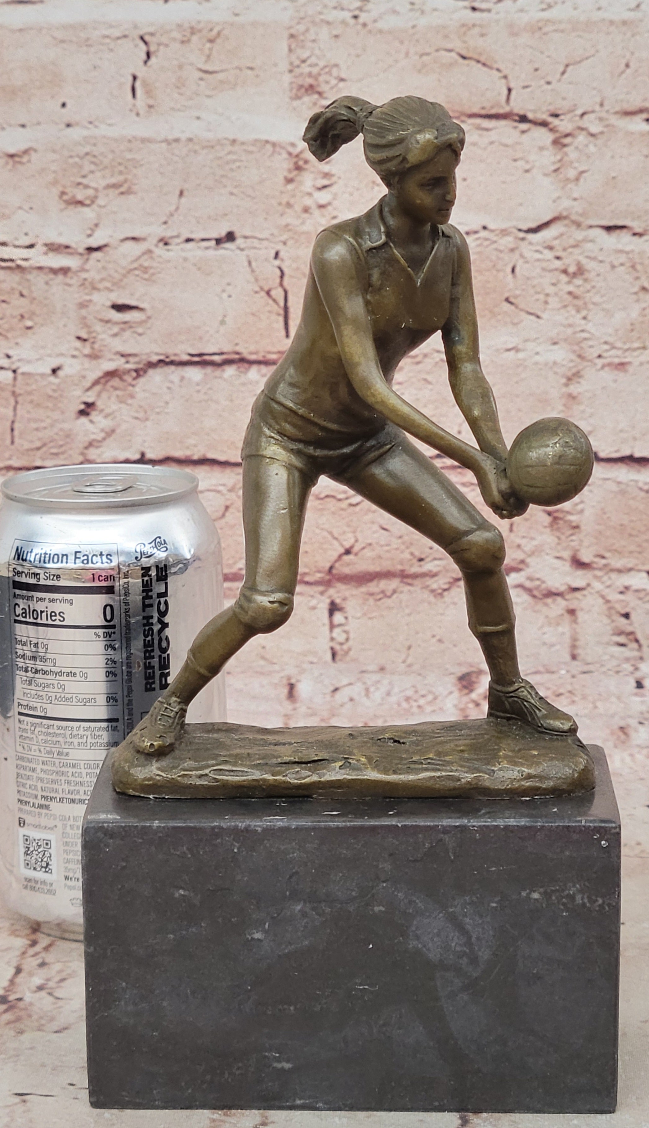 Bronze Cup Female Volleyball Player after Milo. bronze and handmade Decorative