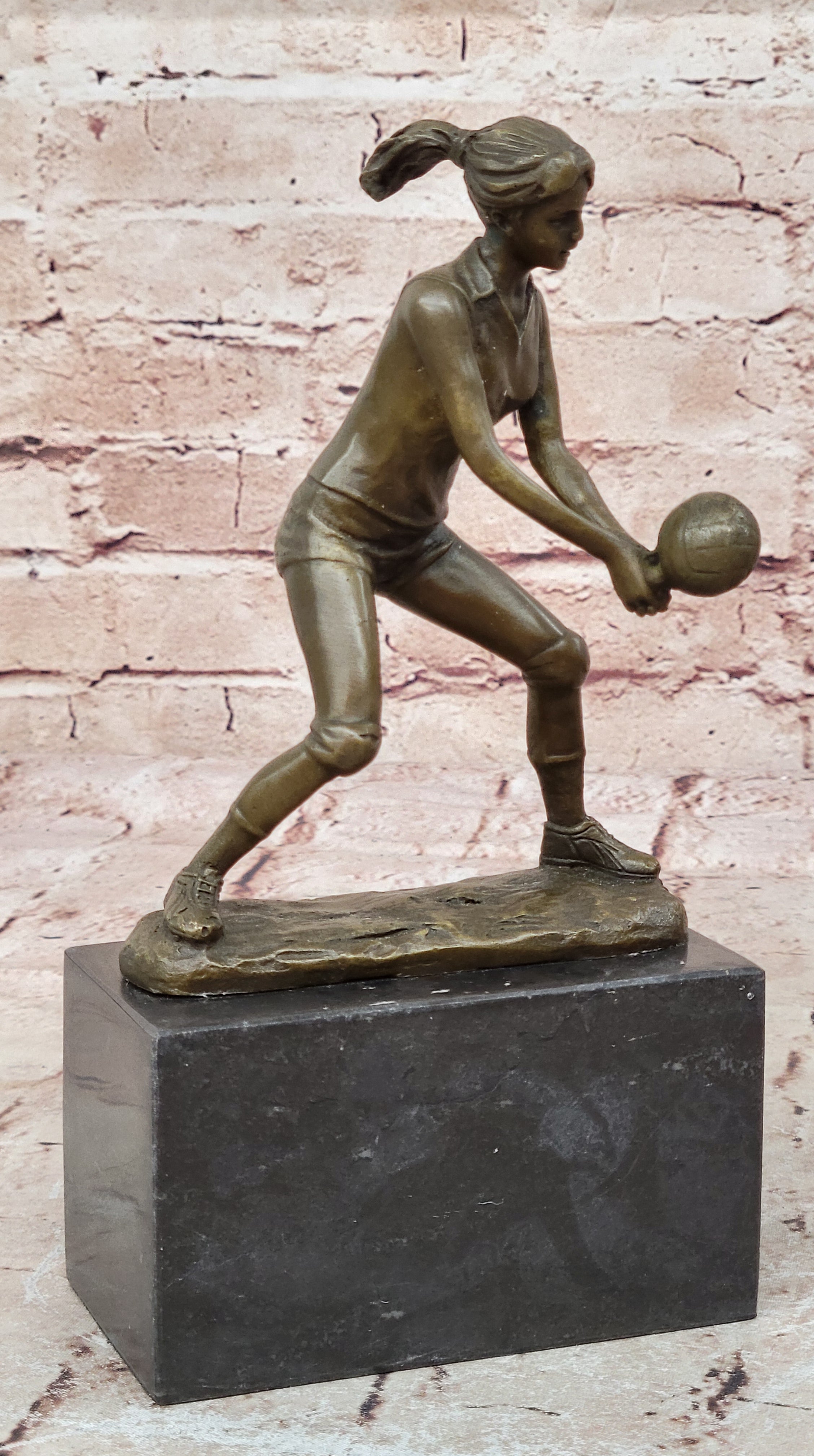 Bronze Cup Female Volleyball Player after Milo. bronze and handmade Decorative
