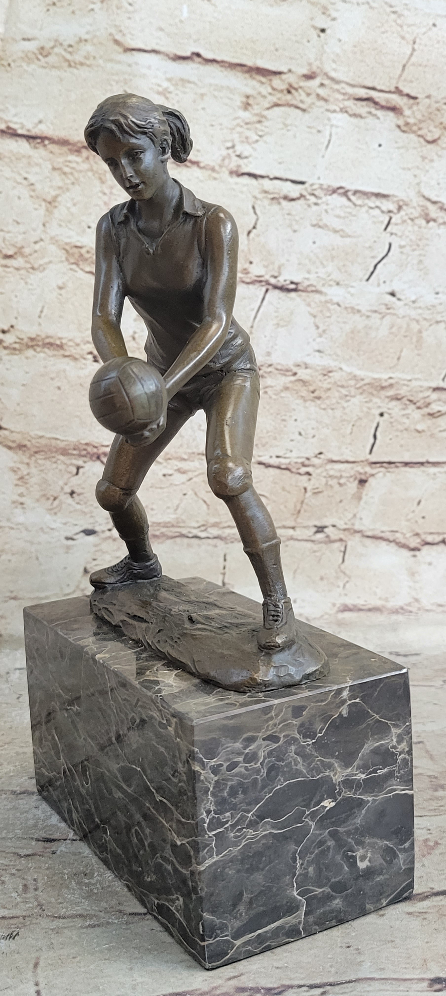 Bronze Cup Female Volleyball Player after Milo. bronze and handmade Decorative
