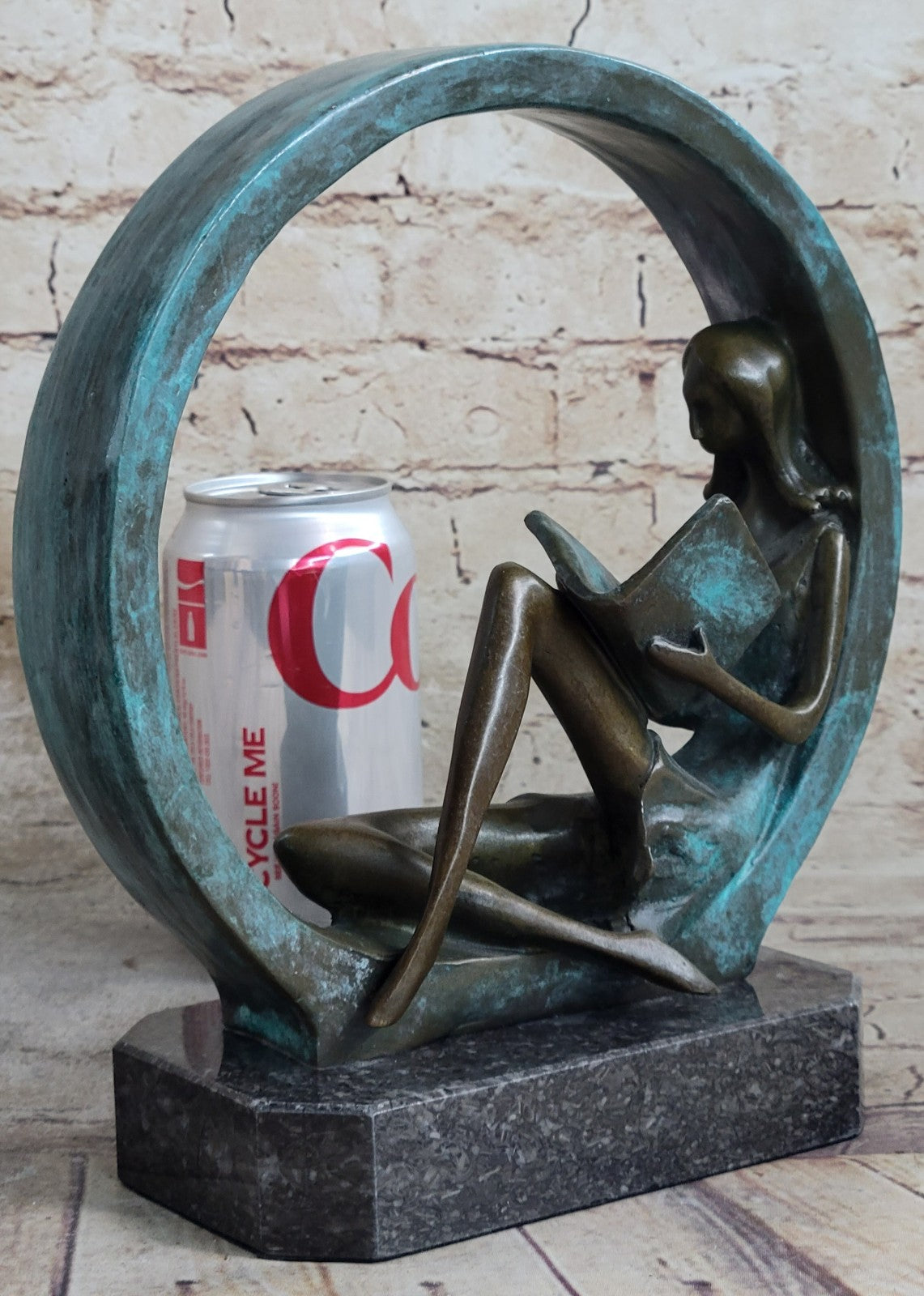 Sweet representation of childlike innocence Girl Reading Book Bronze Sculpture