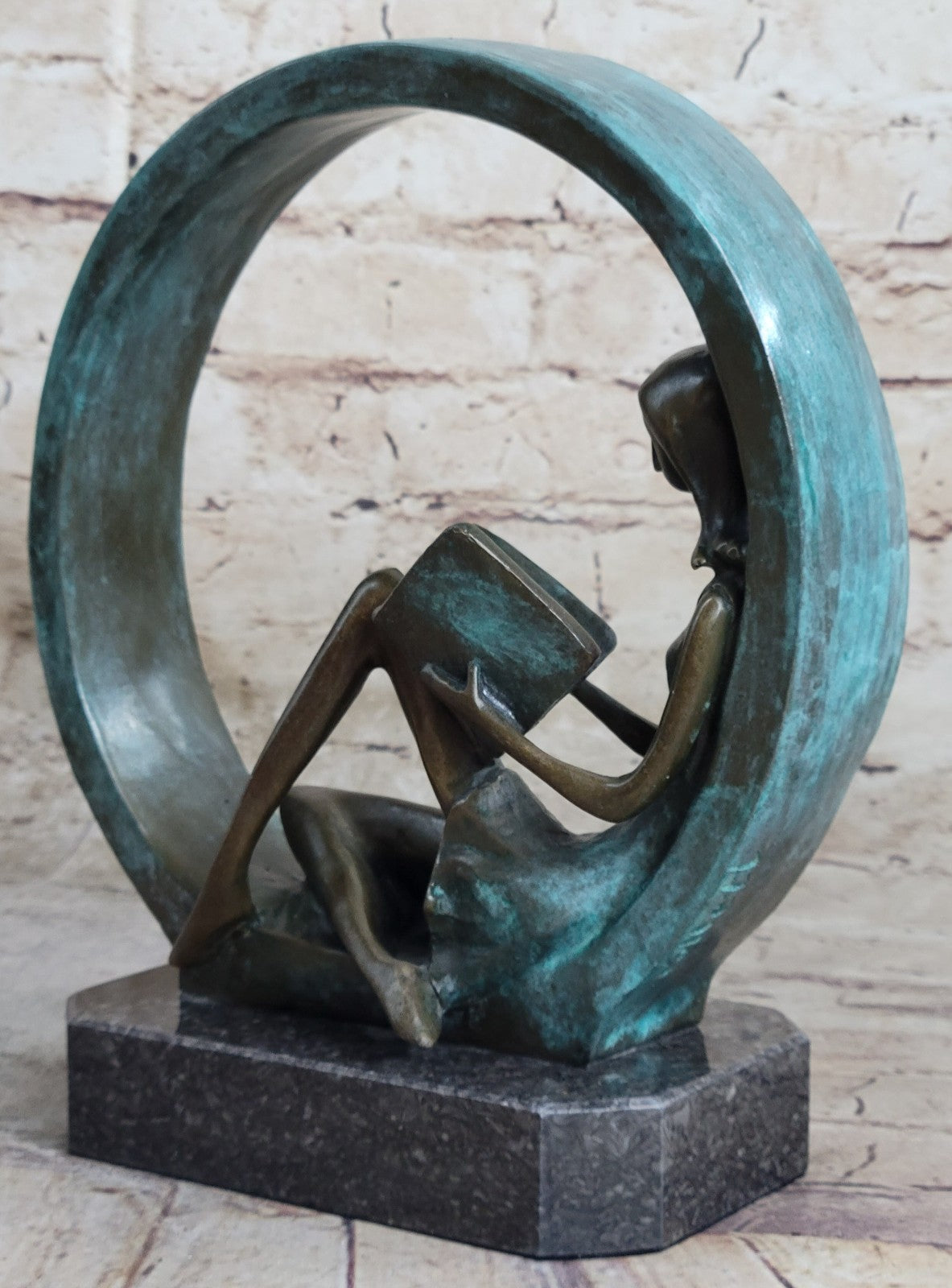 Sweet representation of childlike innocence Girl Reading Book Bronze Sculpture