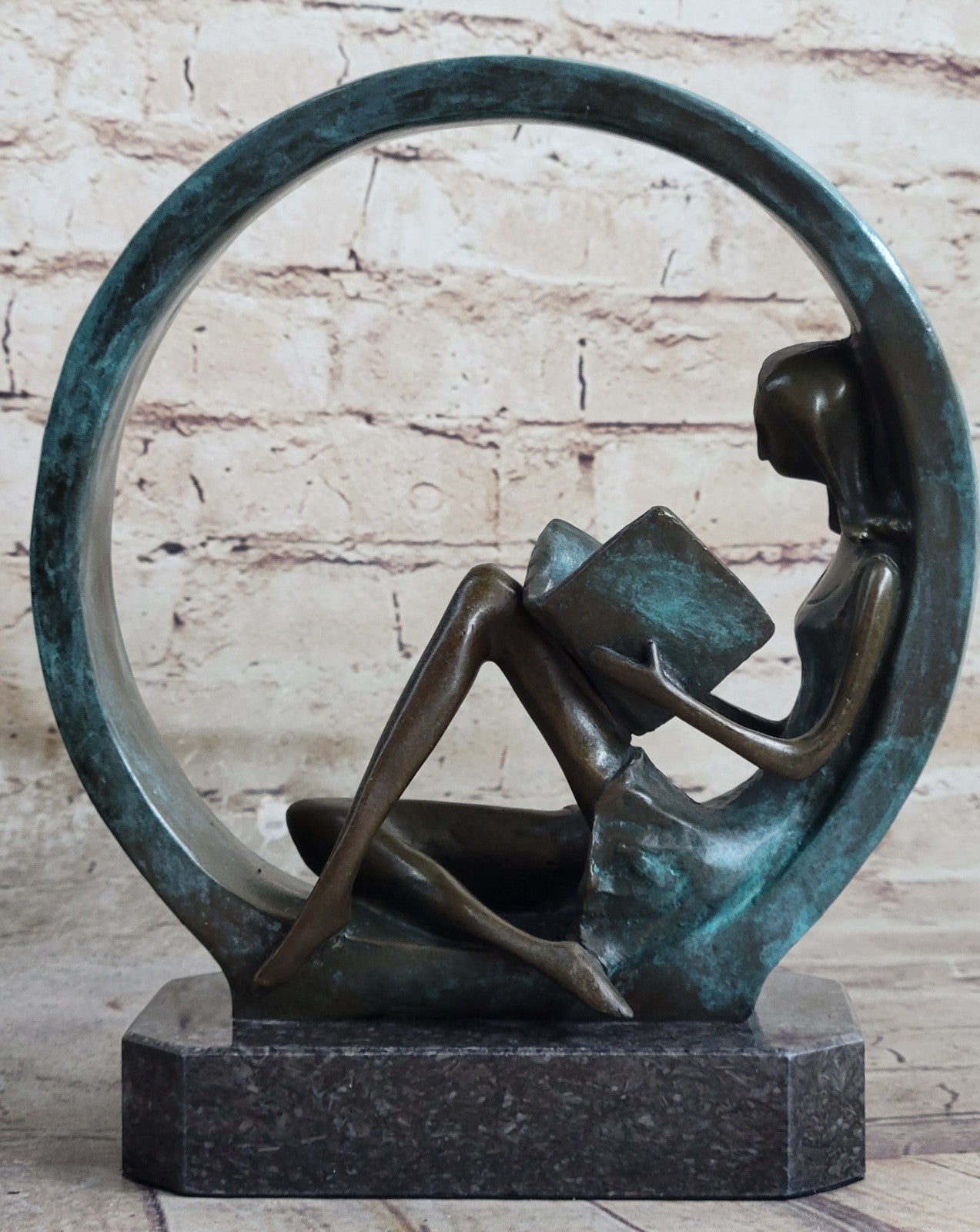 Sweet representation of childlike innocence Girl Reading Book Bronze Sculpture