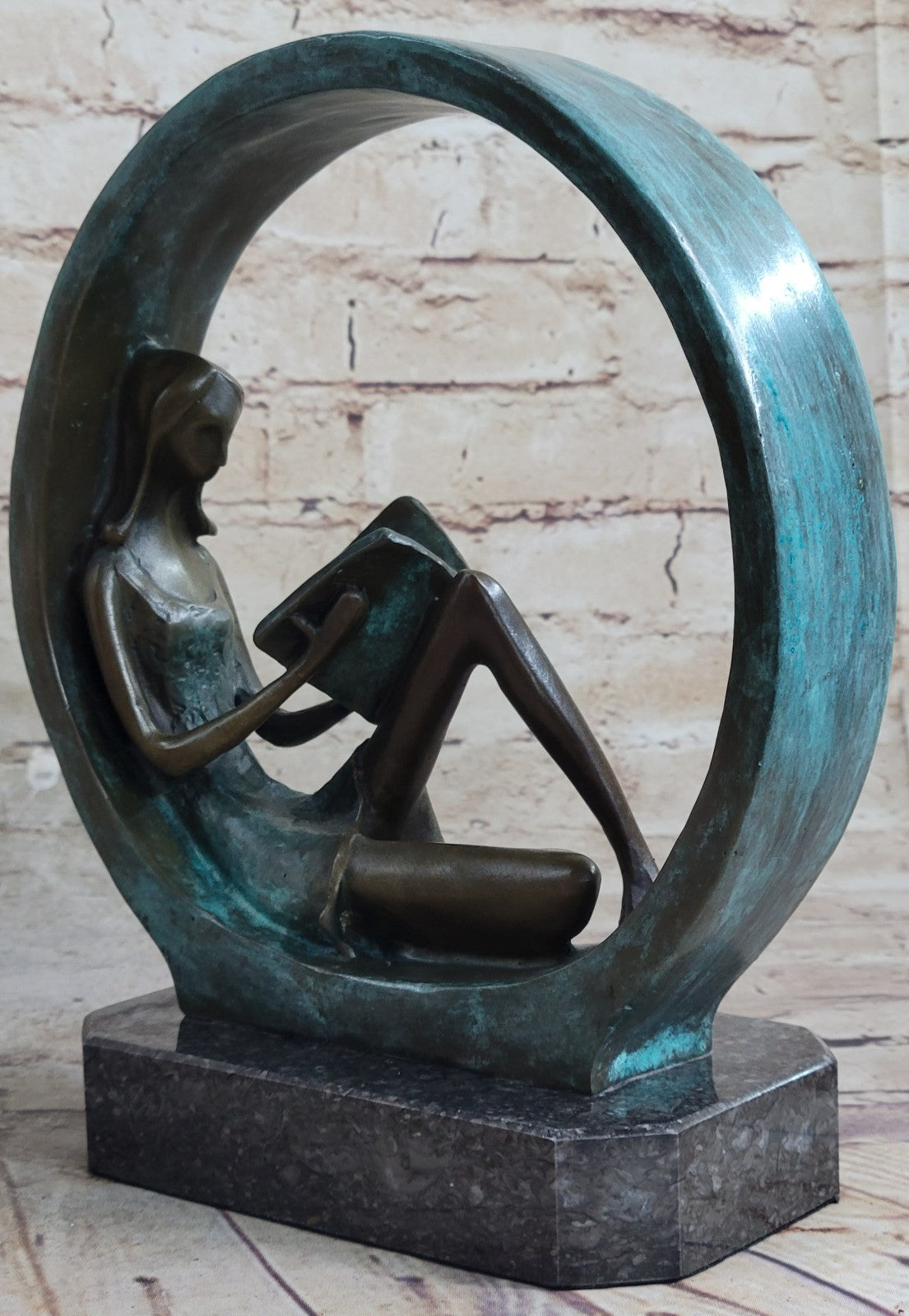 Sweet representation of childlike innocence Girl Reading Book Bronze Sculpture