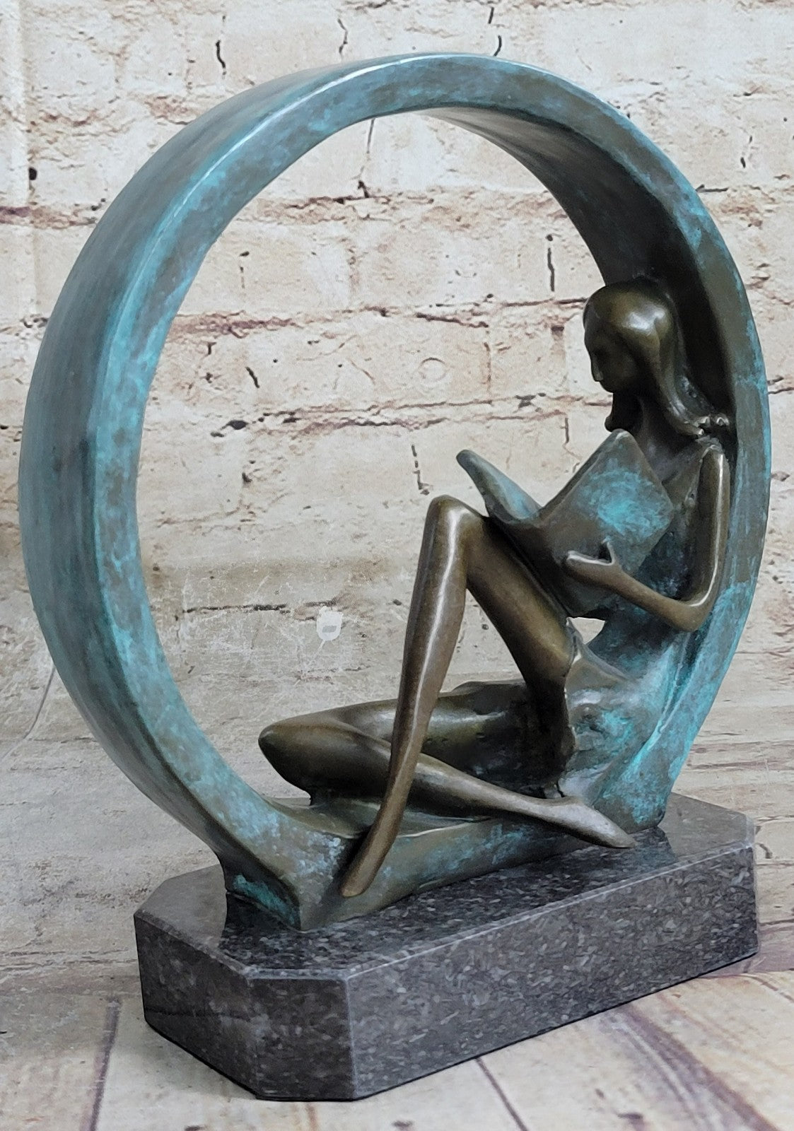 Sweet representation of childlike innocence Girl Reading Book Bronze Sculpture