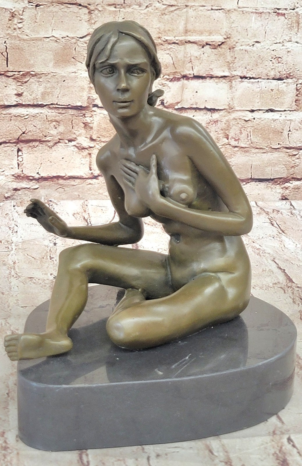 GENNARELLI Art Deco bronze of a nude woman Touching her Breast, marble base.