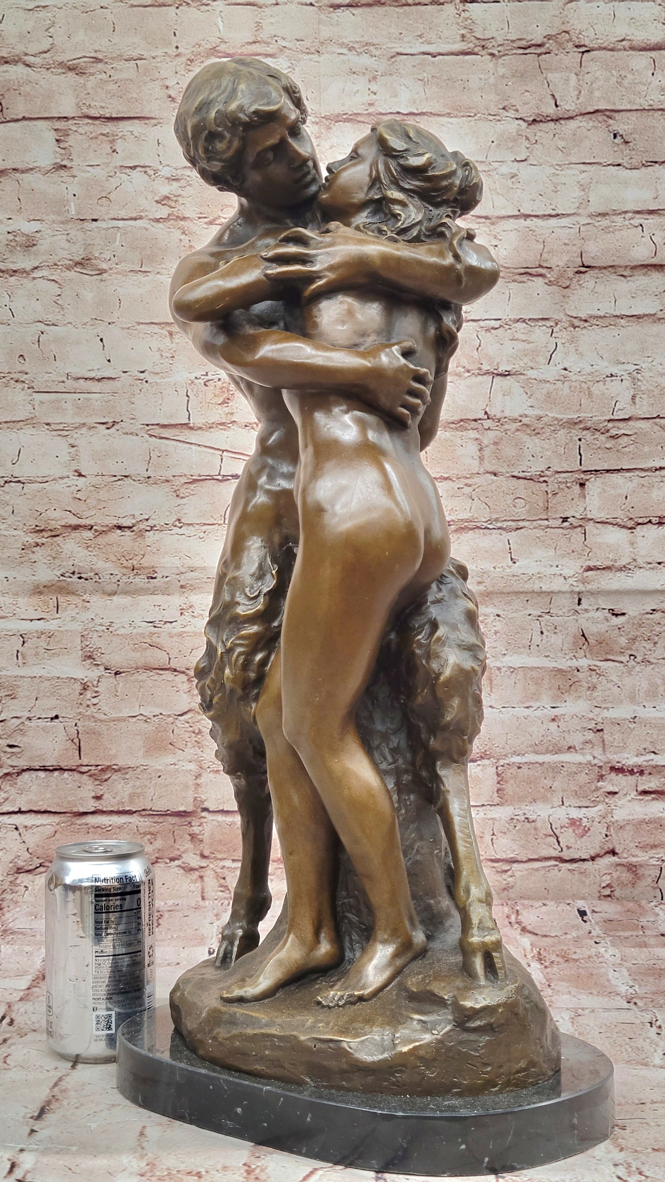 Greek God Pan Faun charms his way in the Arms of a Nude Woman Bronze Statue