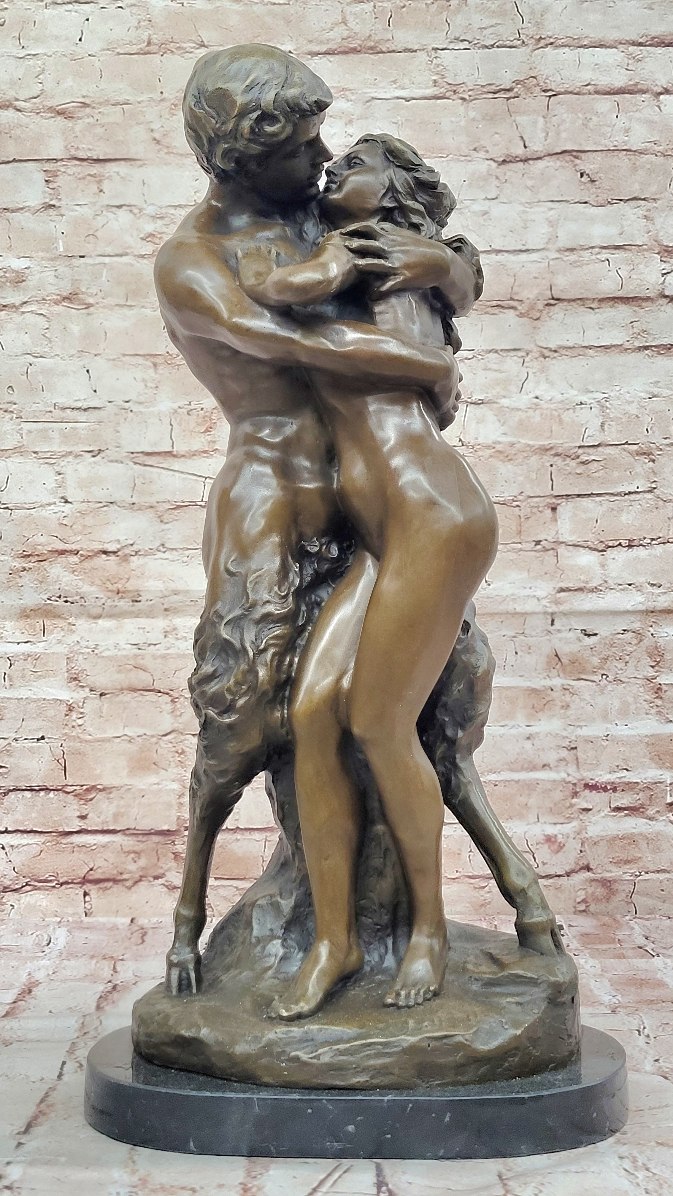 Greek God Pan Faun charms his way in the Arms of a Nude Woman Bronze Statue