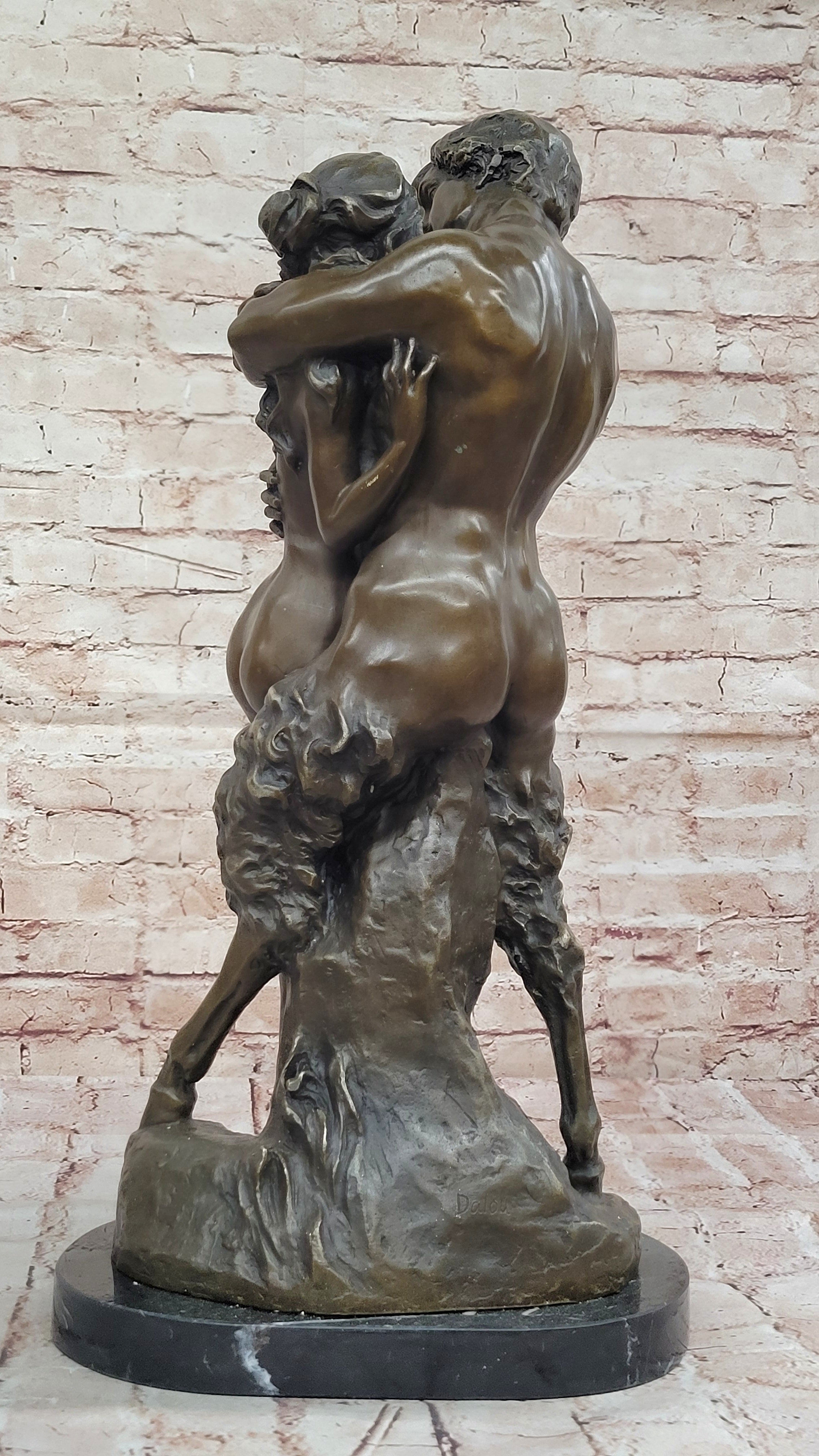 Greek God Pan Faun charms his way in the Arms of a Nude Woman Bronze Statue
