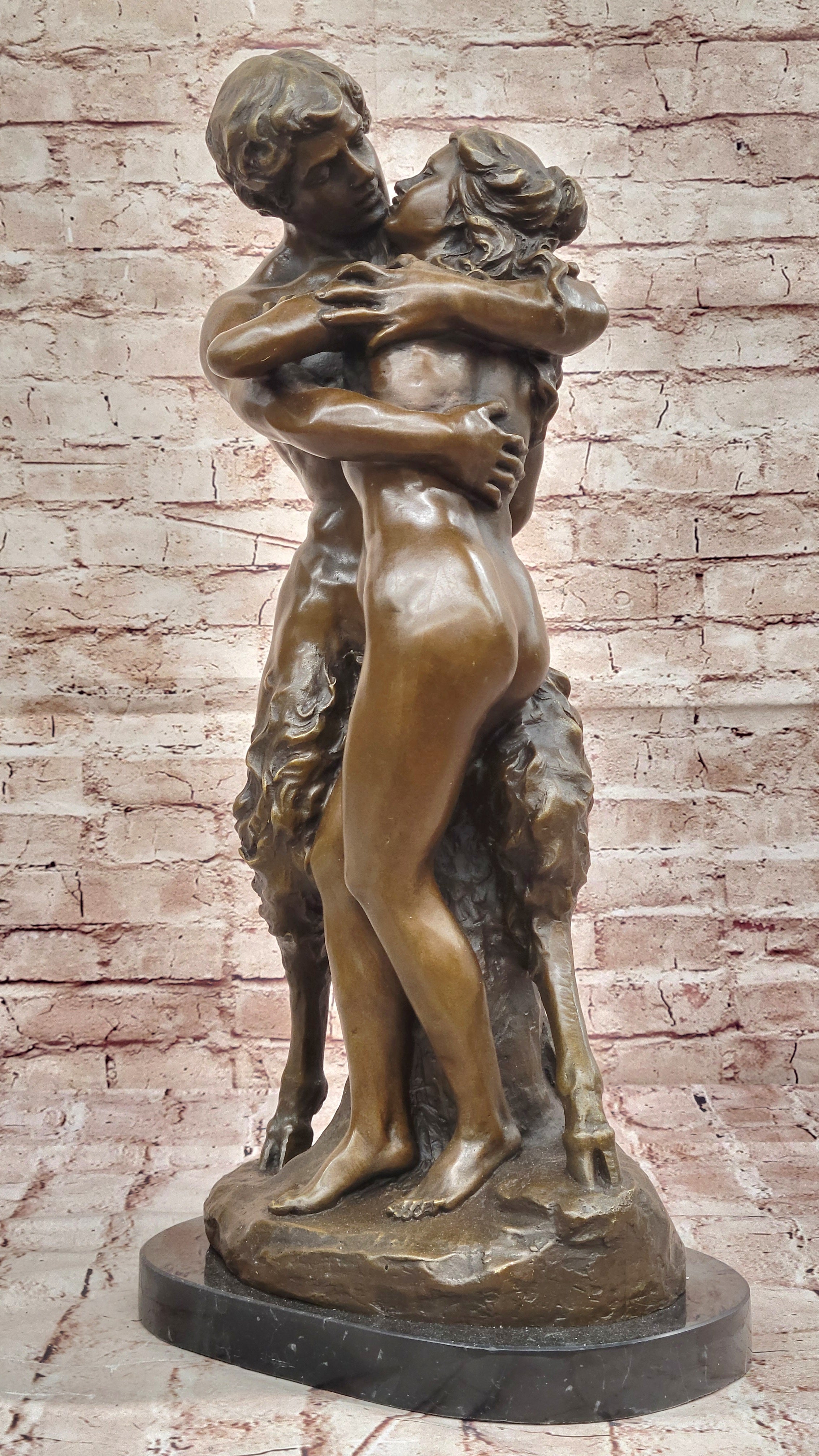 Greek God Pan Faun charms his way in the Arms of a Nude Woman Bronze Statue