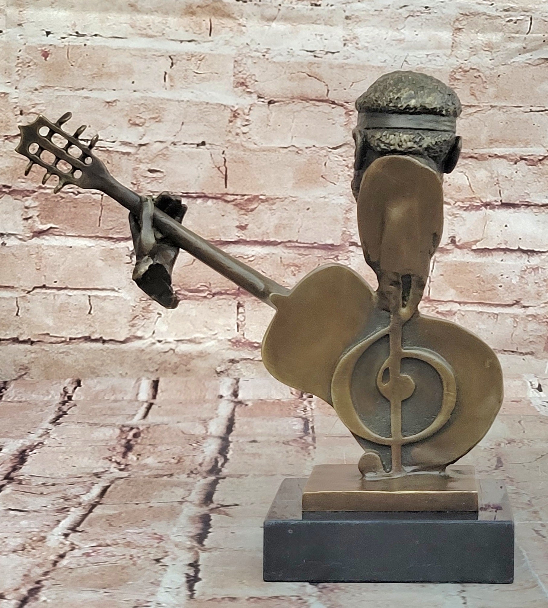 UNUSUAL MID-CENTURY MODERNIST solid 9 1/2" BRONZE SCULPTURE- BASE GUITAR PLAYER