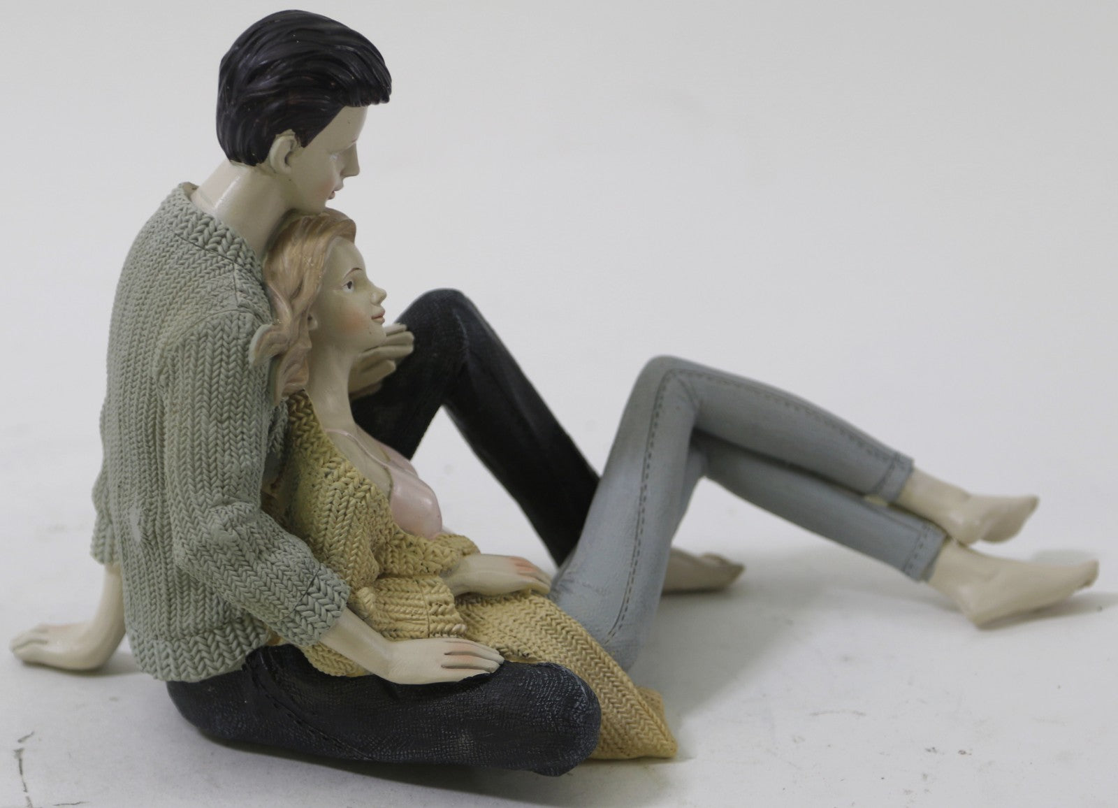 European Finery Collection Handcrafted Snuggling Couple Fossil Ivory Stone Sculpture