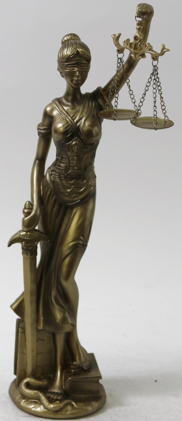 Bronze colored blind justice figure sits atop a base Attorney Student Gift