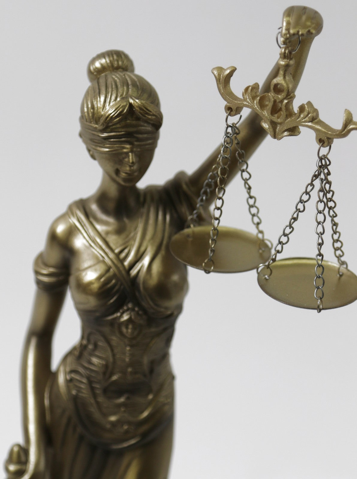 Bronze colored blind justice figure sits atop a base Attorney Student Gift