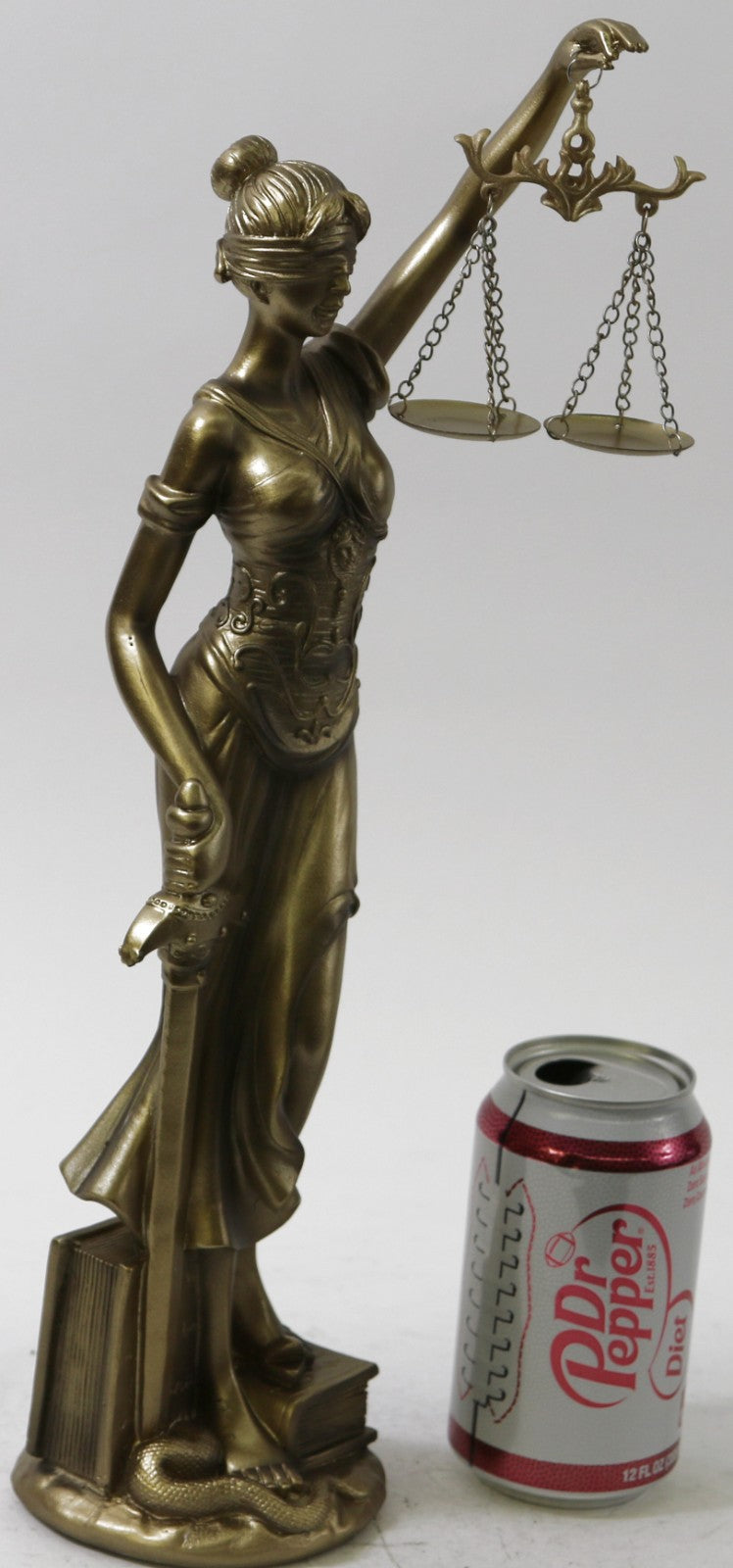 Bronze colored blind justice figure sits atop a base Attorney Student Gift