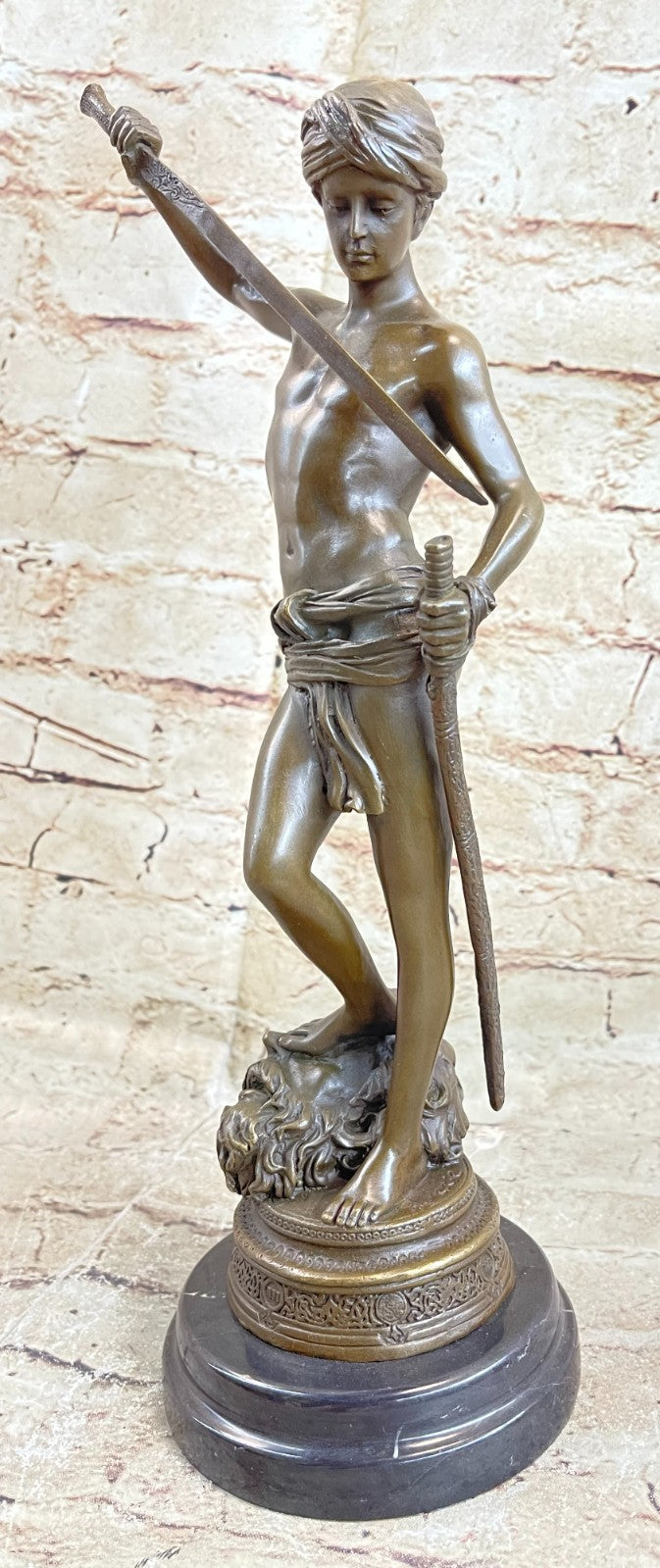 Turn of century bronze statue representing David and Goliath. Signed "A. Mercie