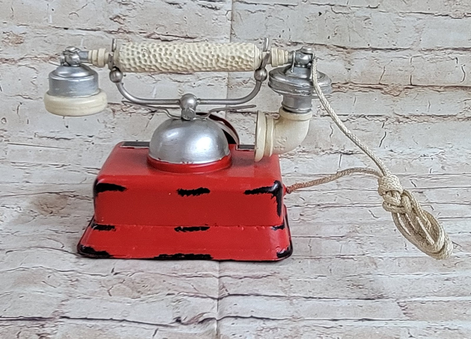 "Decorate for any table, desk, or shelf in sporty fashion with Our Rustic Red German Rotary Dial Phone..."