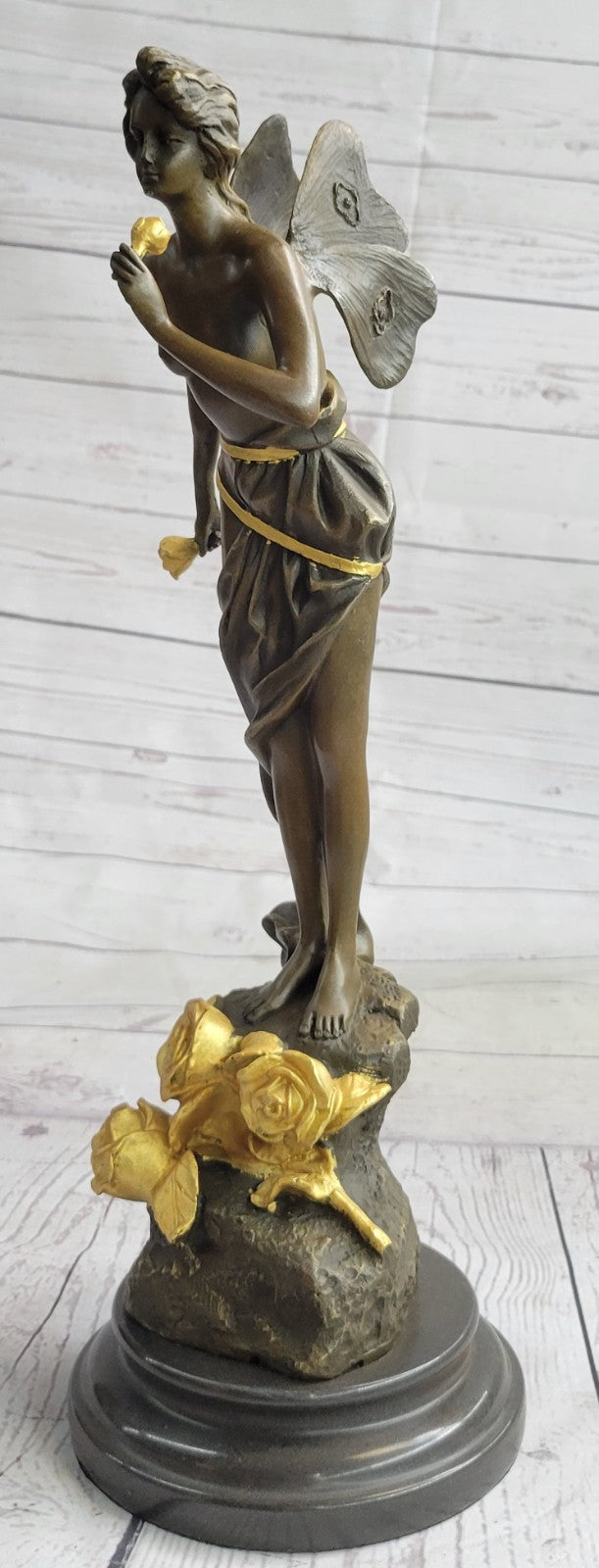 Nude Winged Fairy Angel with Gold Patina Holding Flower Bronze Sculpture