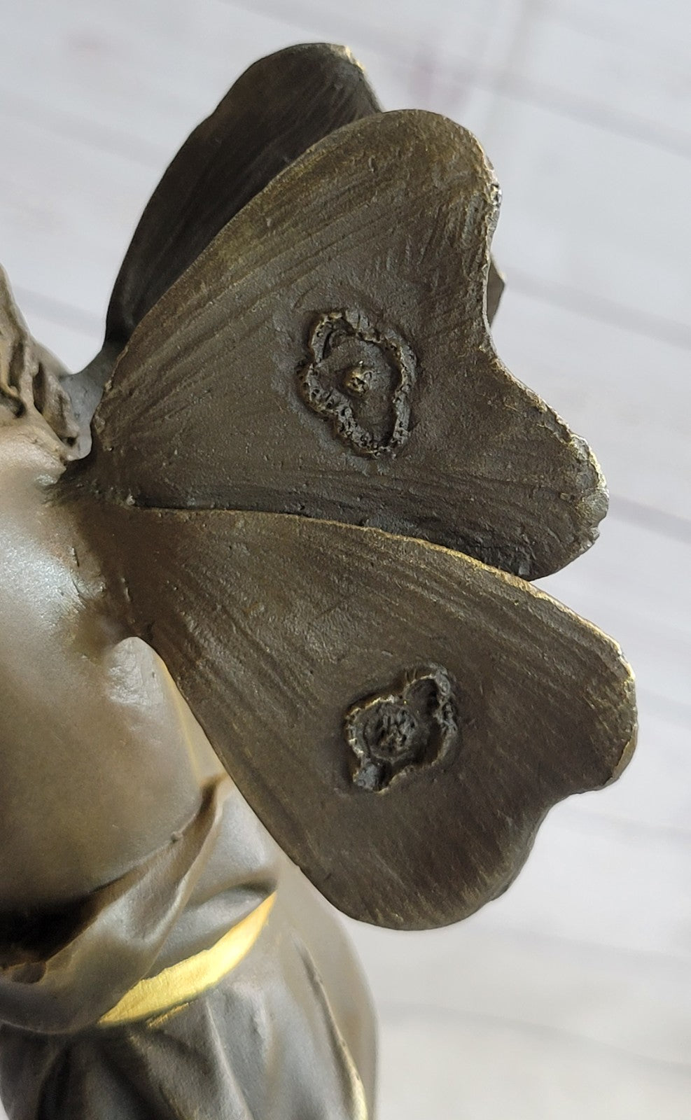 Nude Winged Fairy Angel with Gold Patina Holding Flower Bronze Sculpture