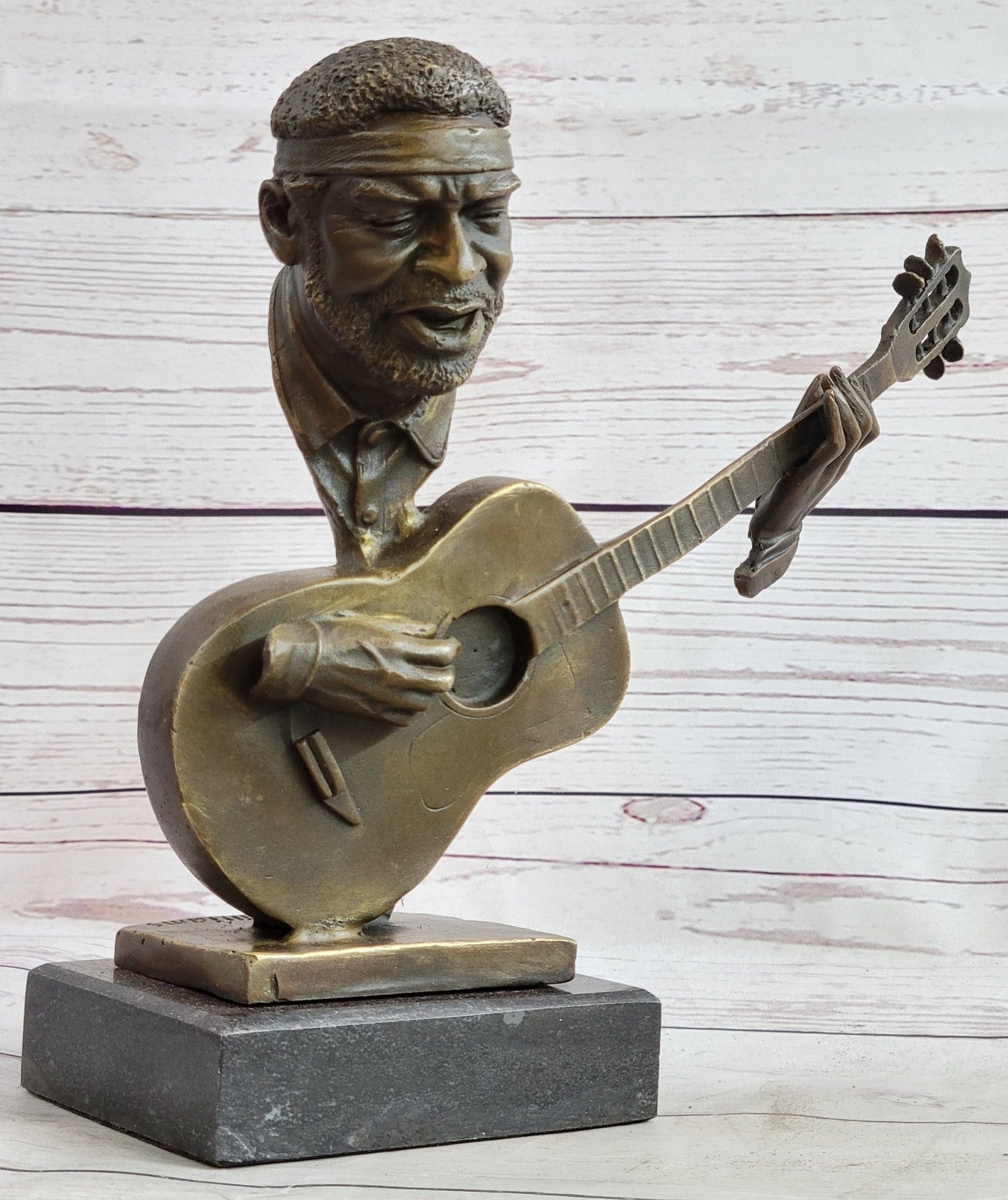UNUSUAL MID-CENTURY MODERNIST solid 9 1/2" BRONZE SCULPTURE- BASE GUITAR PLAYER