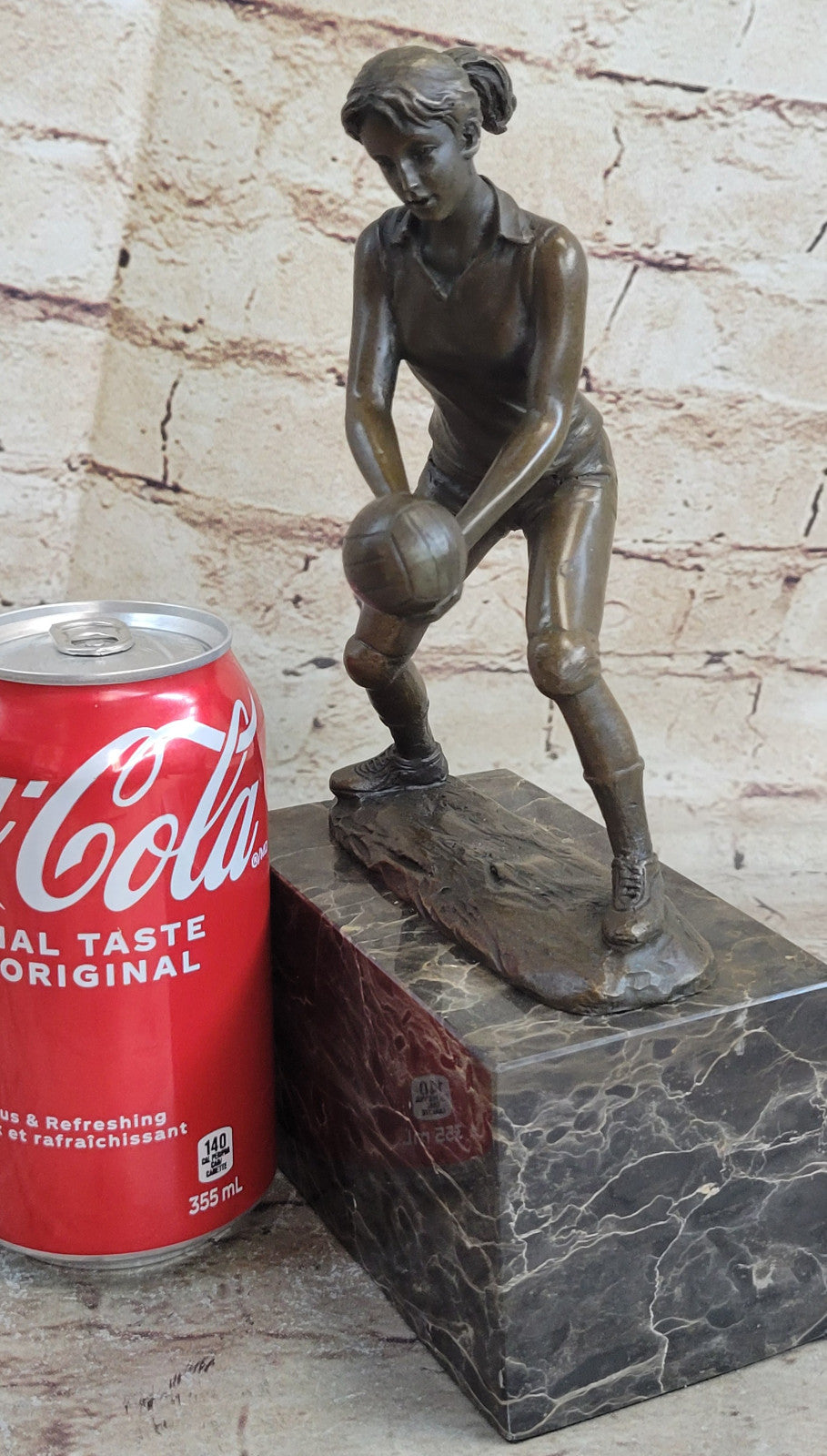Bronze Cup Female Volleyball Player after Milo. bronze and handmade Decorative