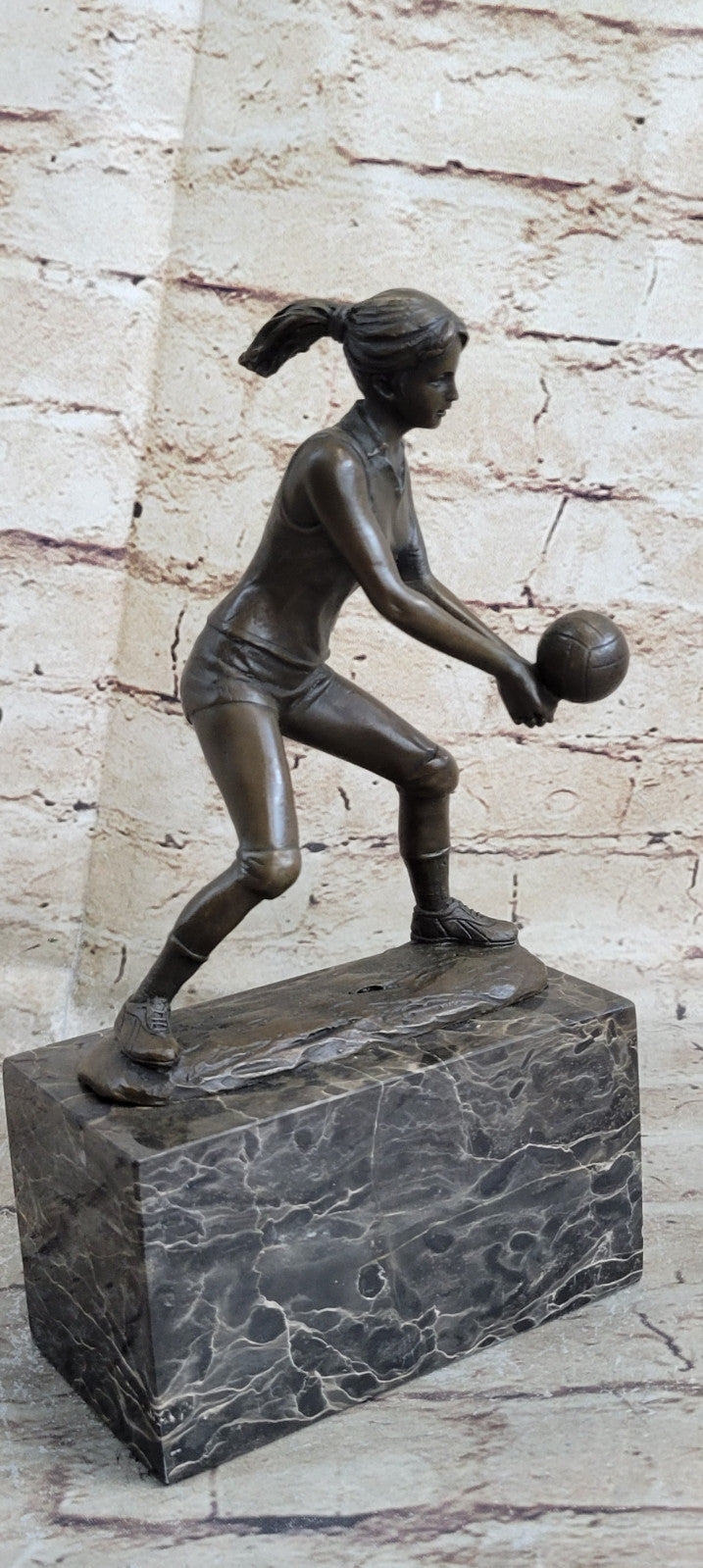 Bronze Cup Female Volleyball Player after Milo. bronze and handmade Decorative