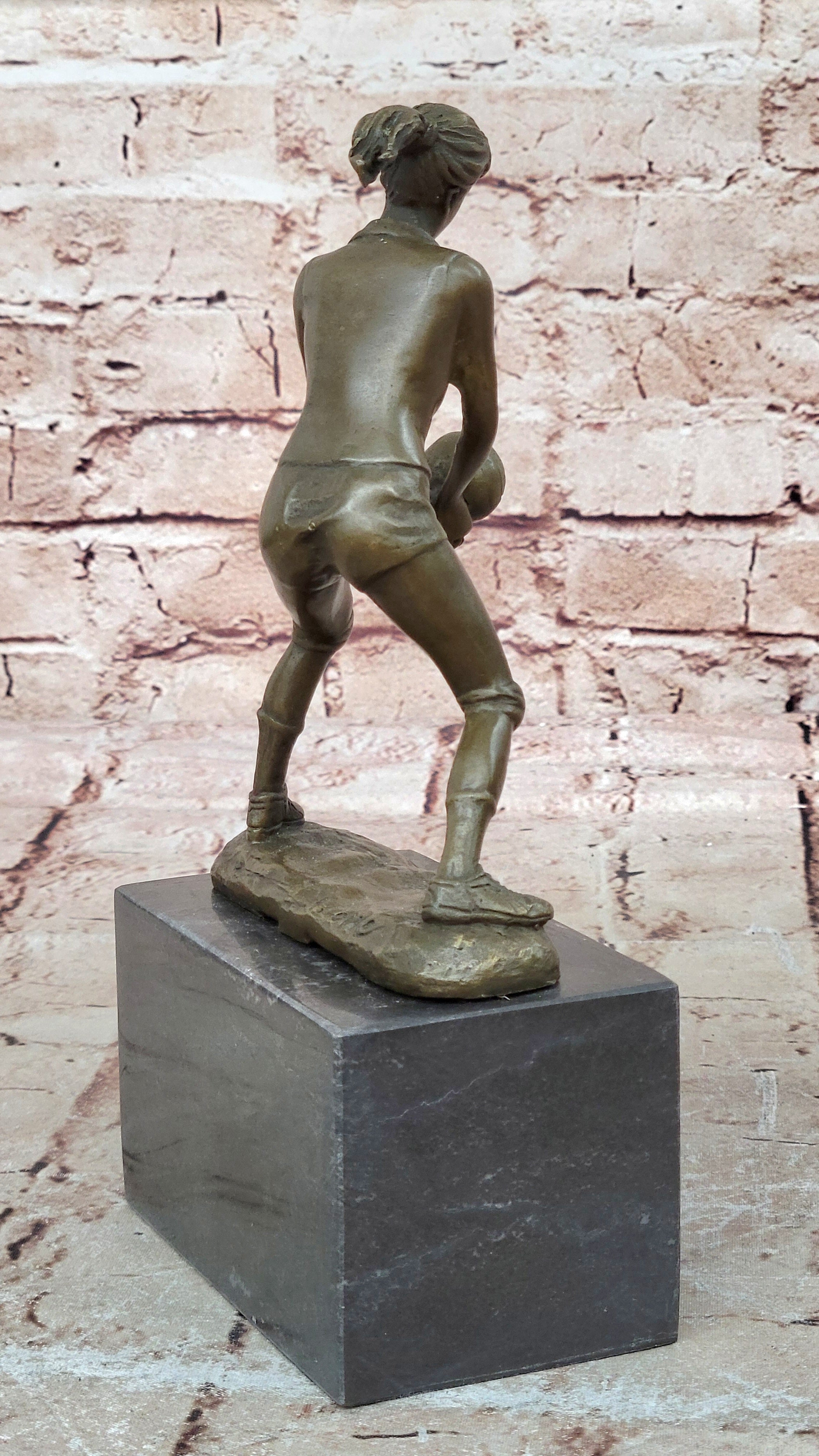 Bronze Cup Female Volleyball Player after Milo. bronze and handmade Decorative