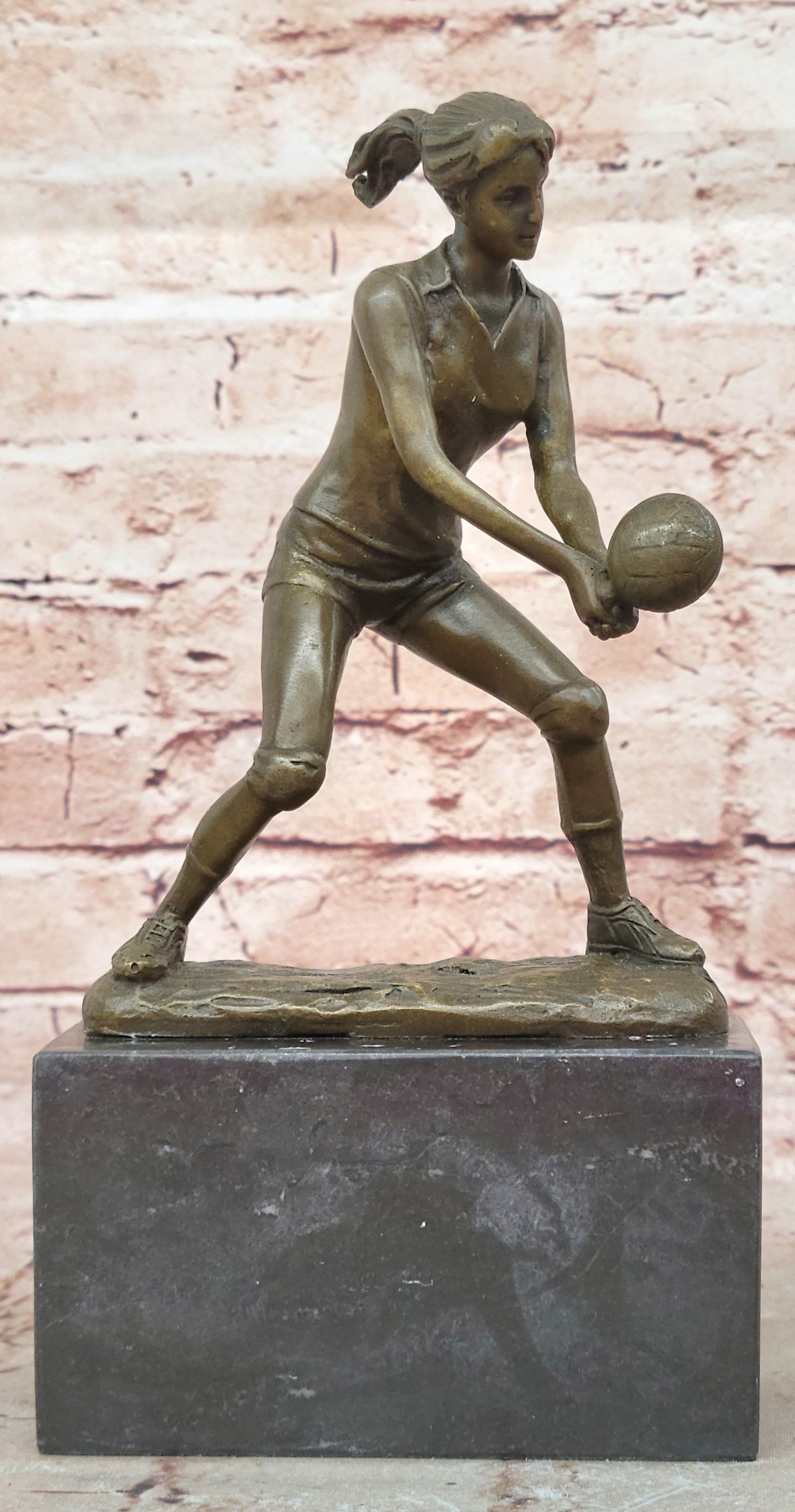Bronze Cup Female Volleyball Player after Milo. bronze and handmade Decorative