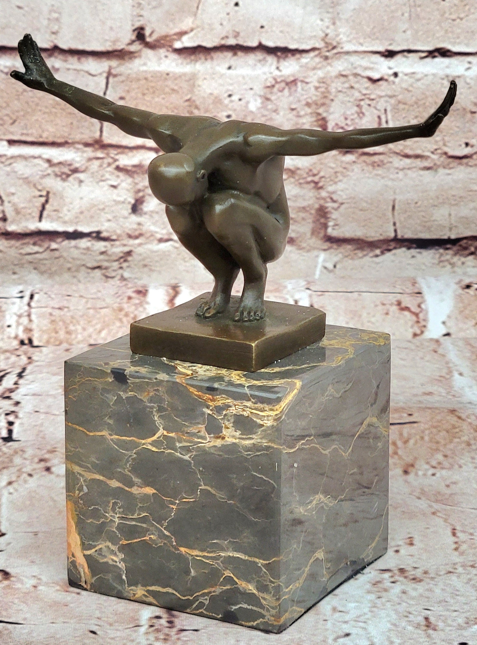 Milo`s Striking Bronze Sculpture: The Athlete, a Testament to Male Athleticism