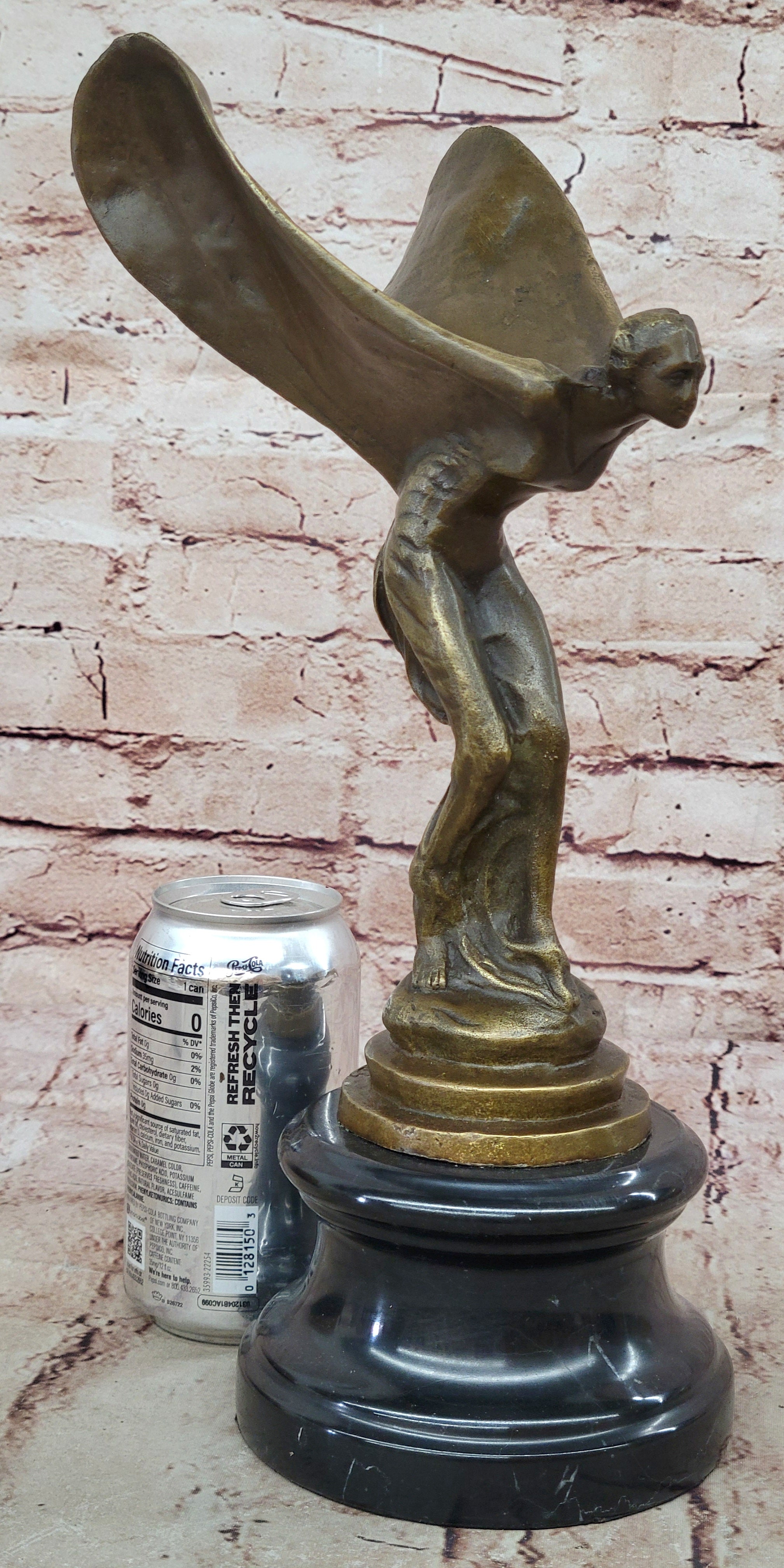 Spirit of Ecstasy Large bronze with brown patina mounted on dark marble base
