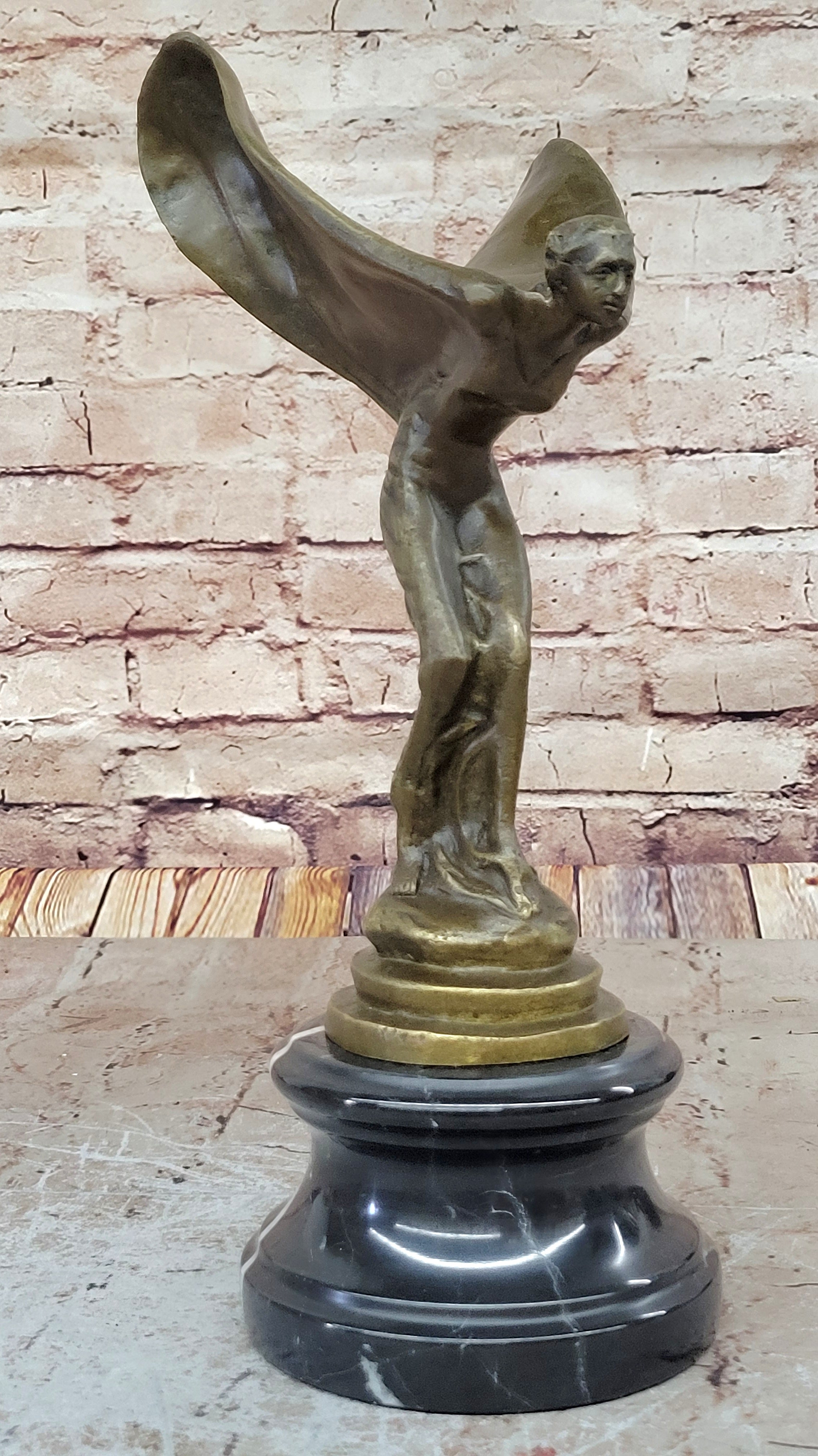 Spirit of Ecstasy Large bronze with brown patina mounted on dark marble base