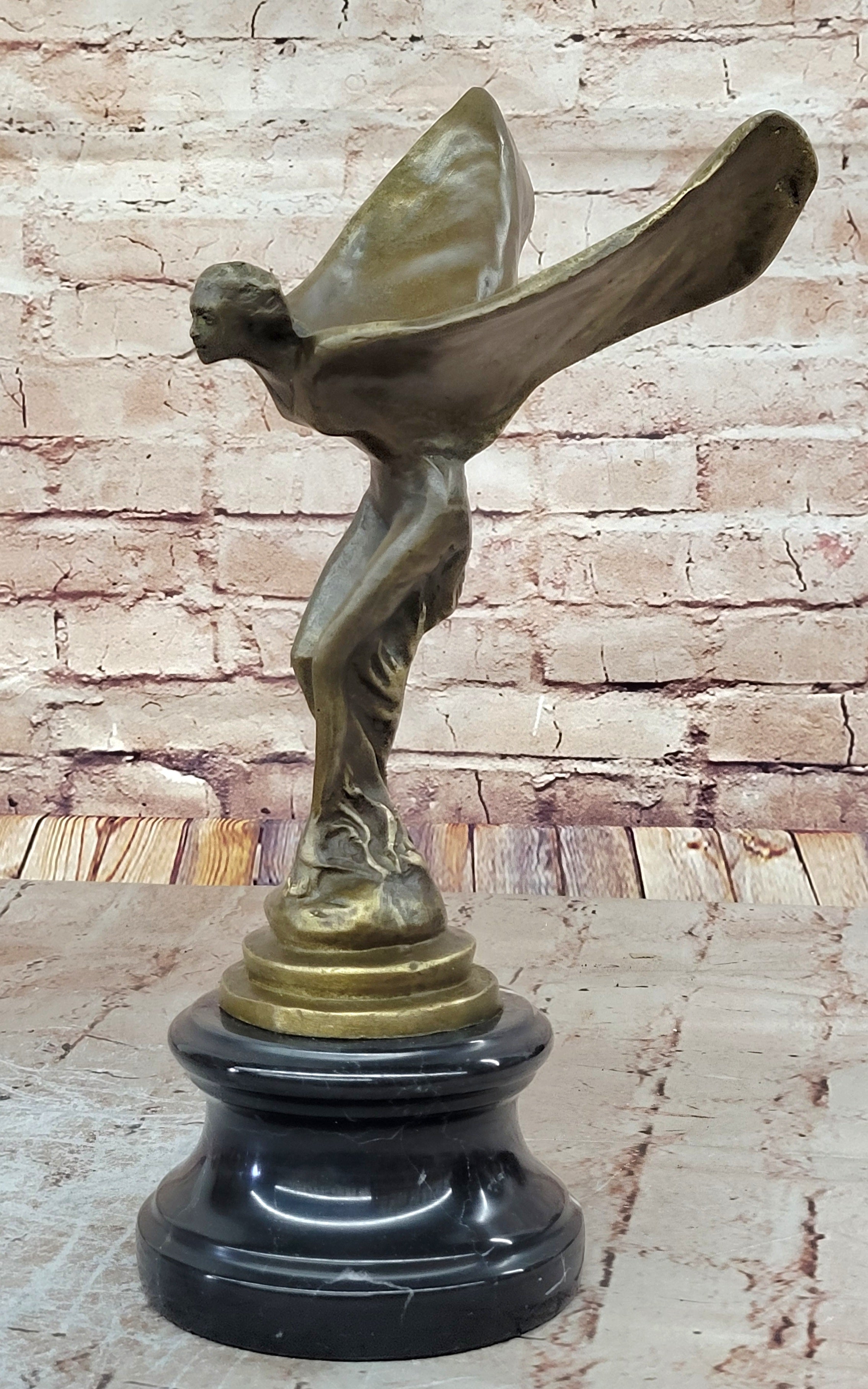 Spirit of Ecstasy Large bronze with brown patina mounted on dark marble base