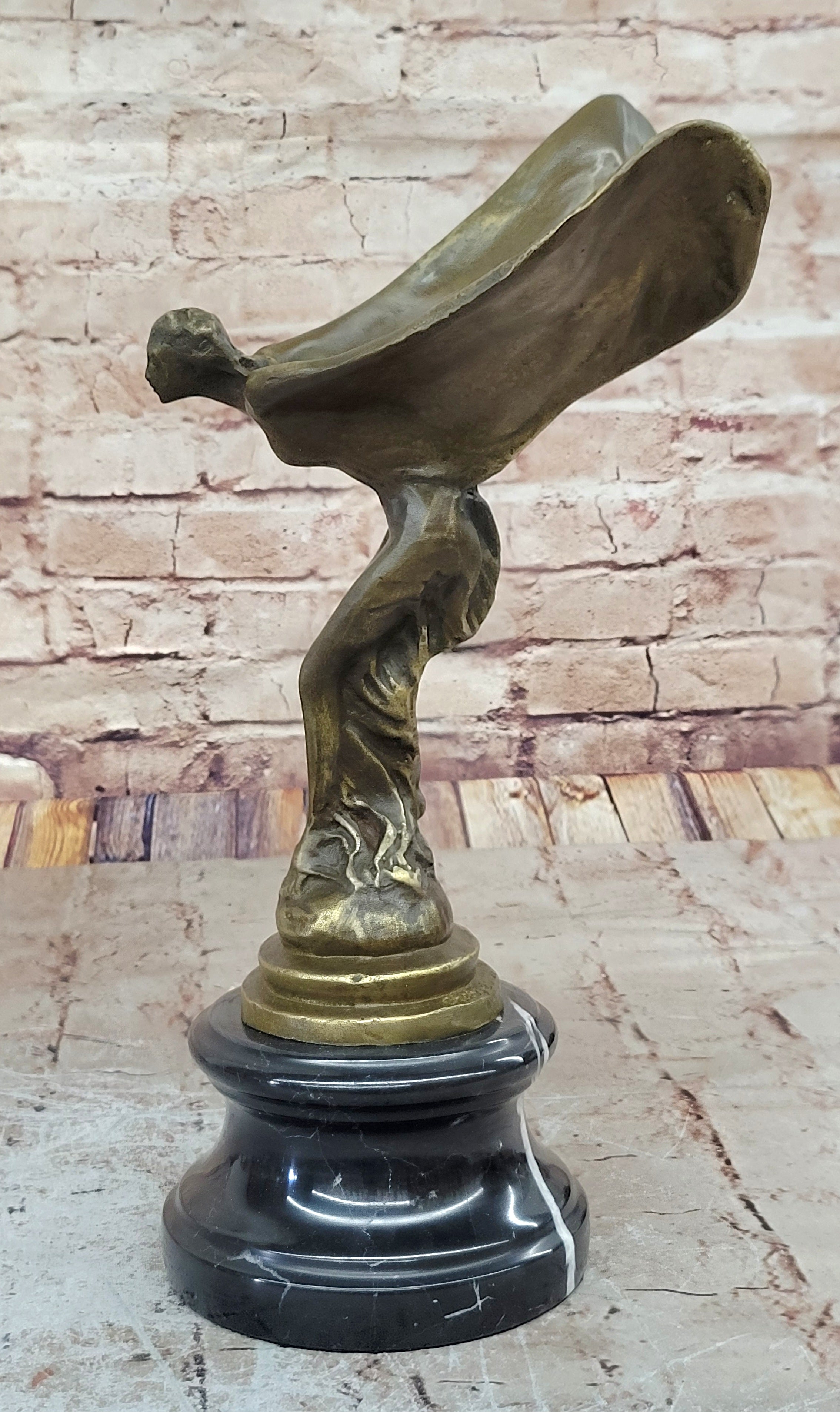Spirit of Ecstasy Large bronze with brown patina mounted on dark marble base