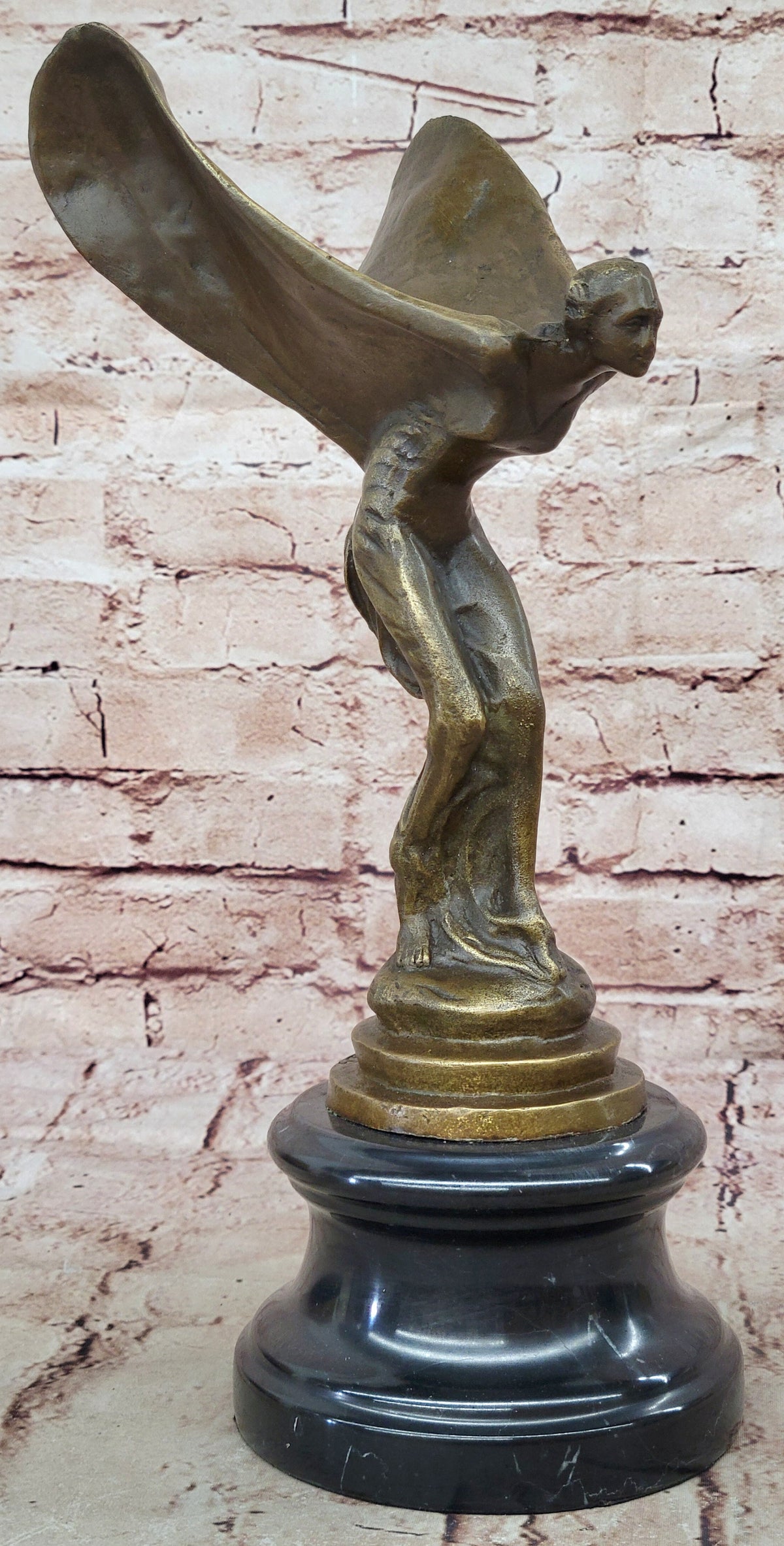 Spirit of Ecstasy Large bronze with brown patina mounted on dark marble base