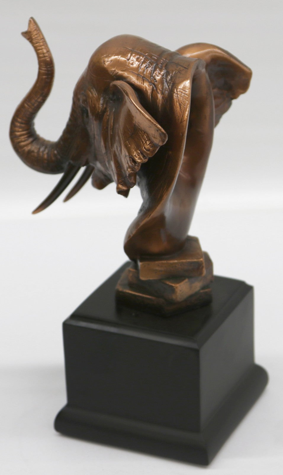 Elephant Head Bust Statue On Black Pedestal for African Jungle Safari Decor Sale