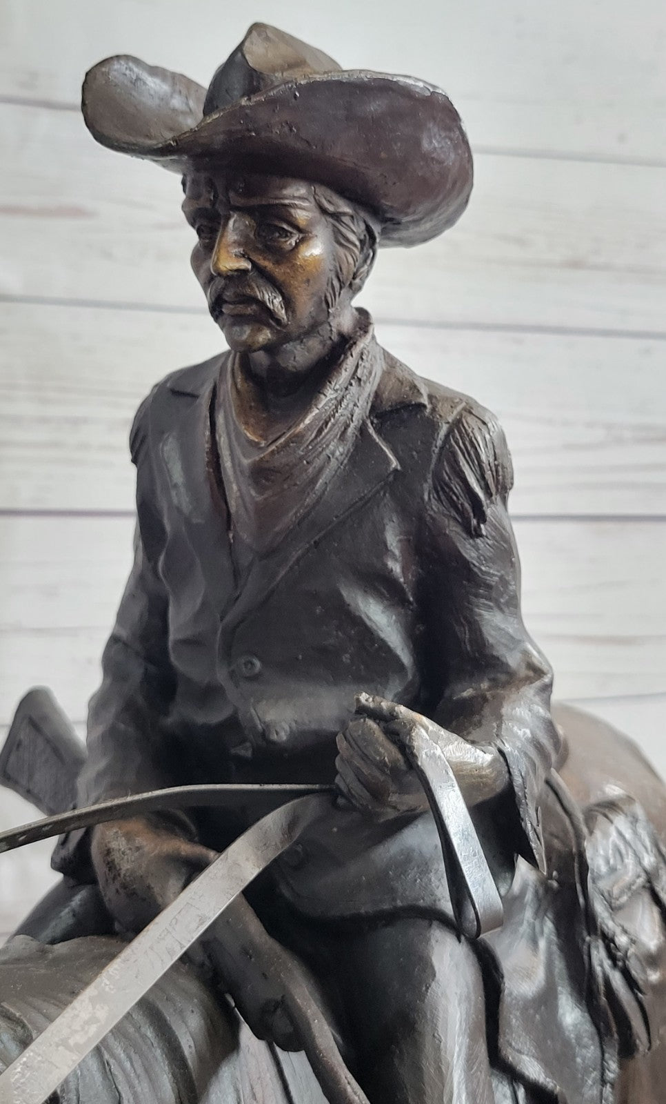 Remington 100% Bronze cowboy with Rifle in hand on horse good patina design