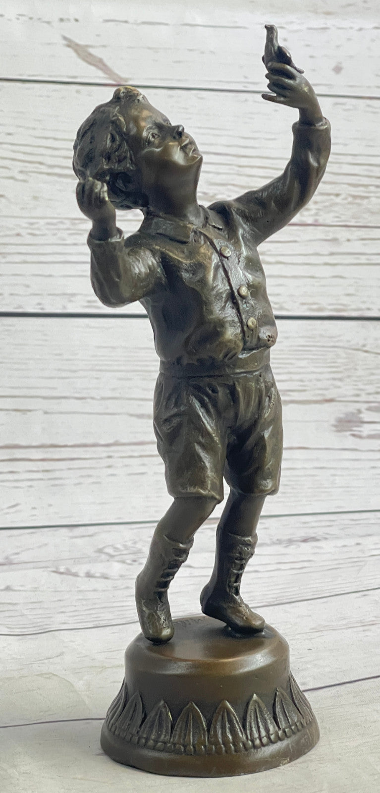 Milo`s Artistry: Intricate Bronze Statue of a Boy Holding a Bird - Handmade by Miguel Lopez