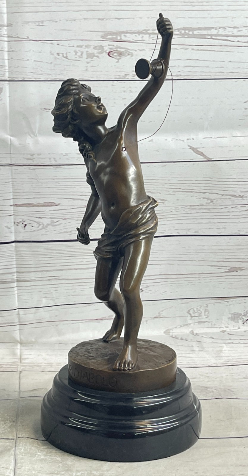 Goldscheider France: Classic Bronze Boy Statue Playing with Yoyo Deal
