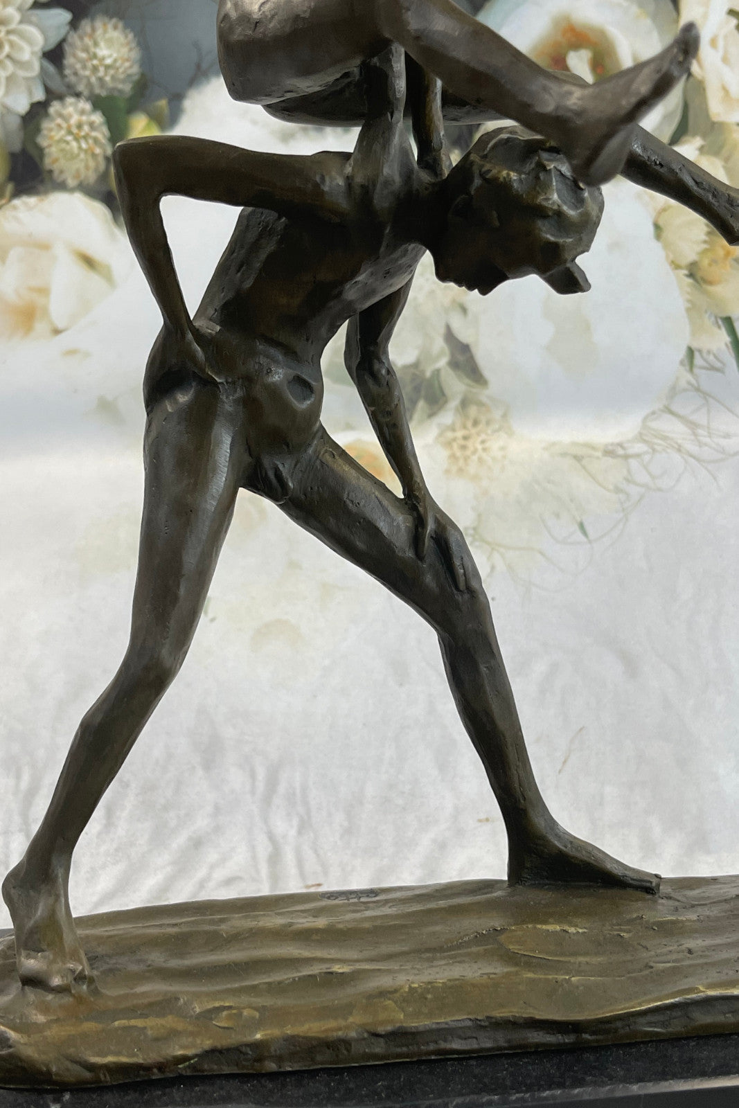 A bronze sculpture depicting two children playing leap-frog Home Decor Sale