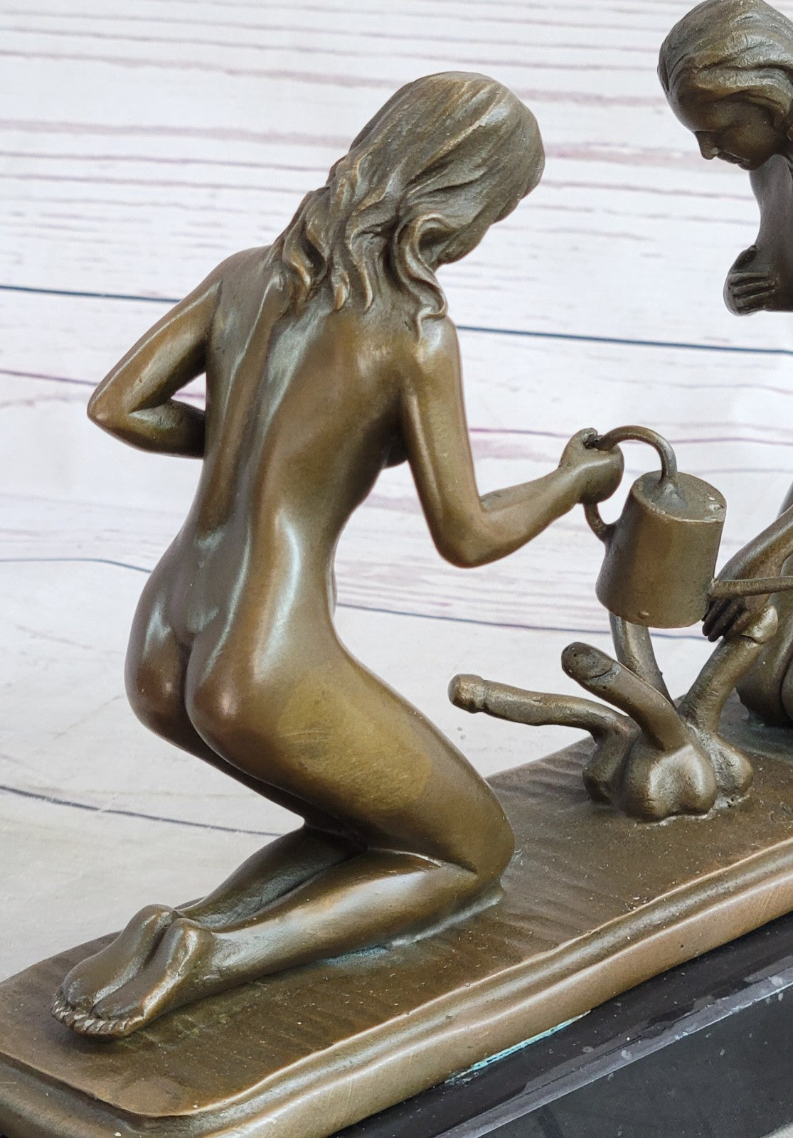 Provocative Bronze Artwork: Sensuous Nude Girl Tending to Growing Erotic Plant Statue