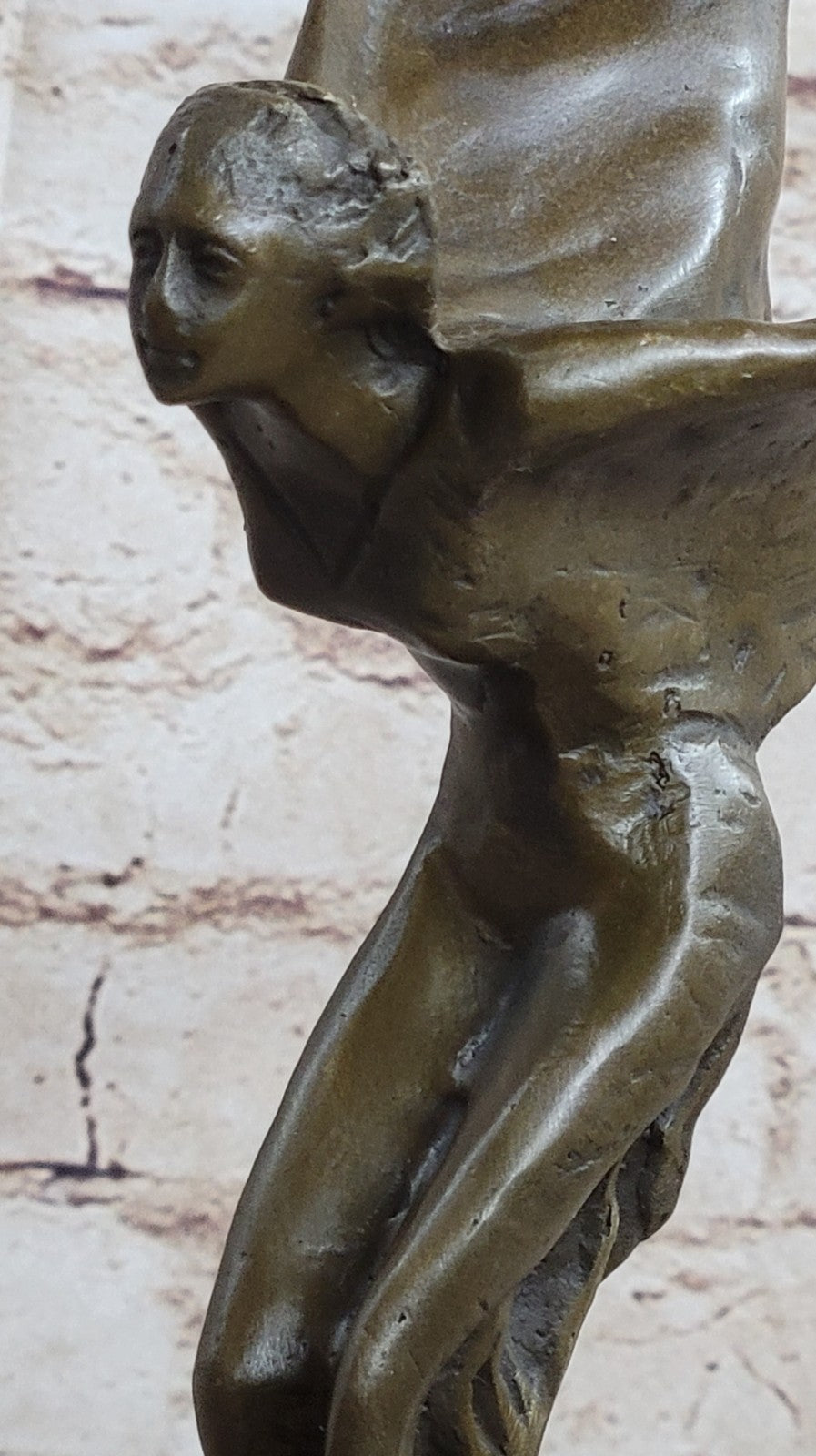Spirit of Ecstasy Large bronze with brown patina mounted on dark marble base