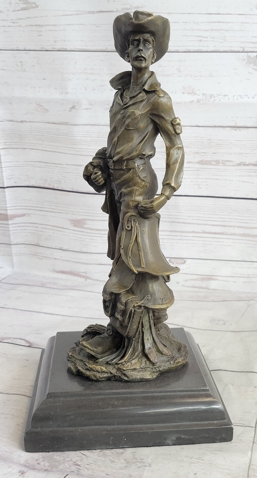 Handcrafted bronze sculpture SALE His Holding Cowboy Old Kamiko Original Signed