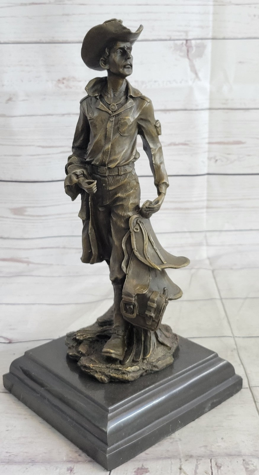 Handcrafted bronze sculpture SALE His Holding Cowboy Old Kamiko Original Signed